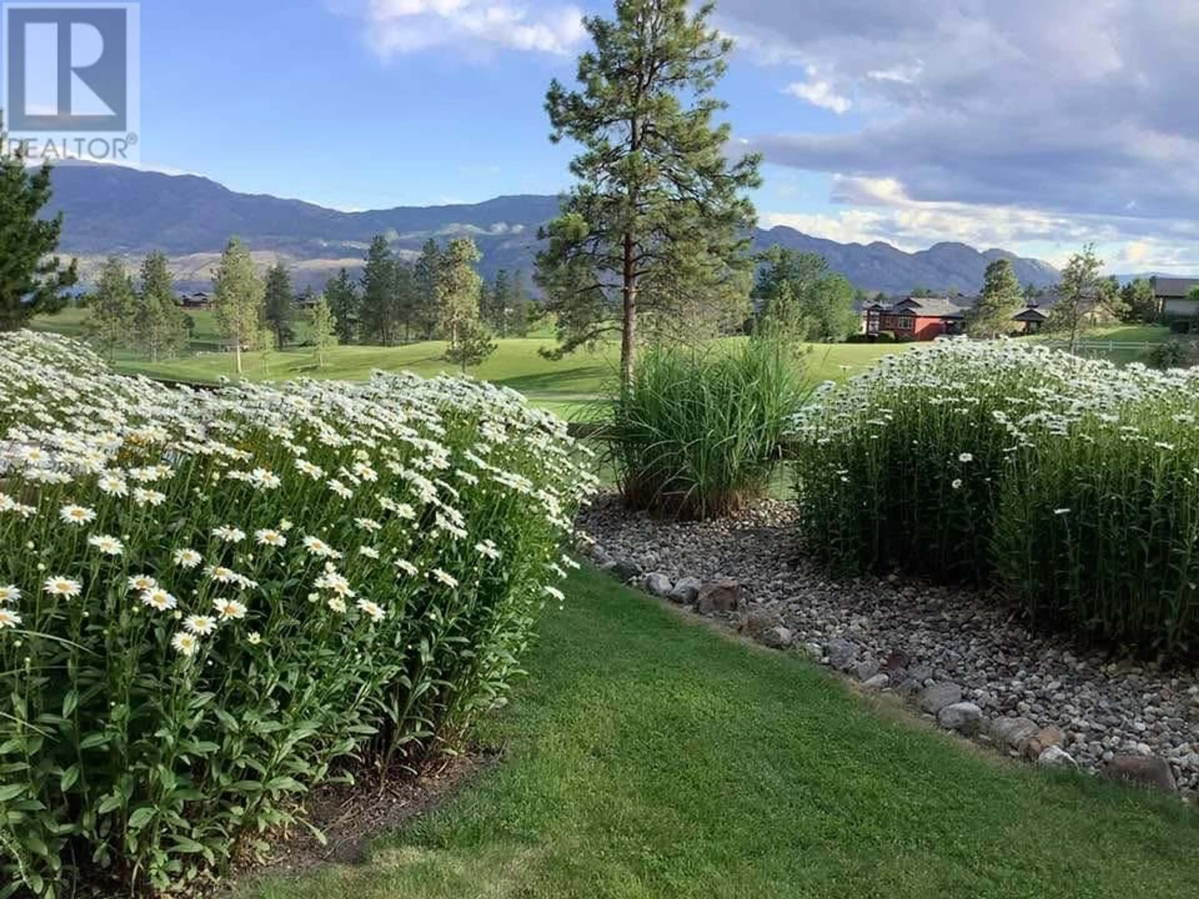 A pic from outside/outdoor area/front of a property/back of a property/a pic from drone, mountain view for 106 - 3533 CARRINGTON ROAD, Westbank British Columbia V4T2Z9