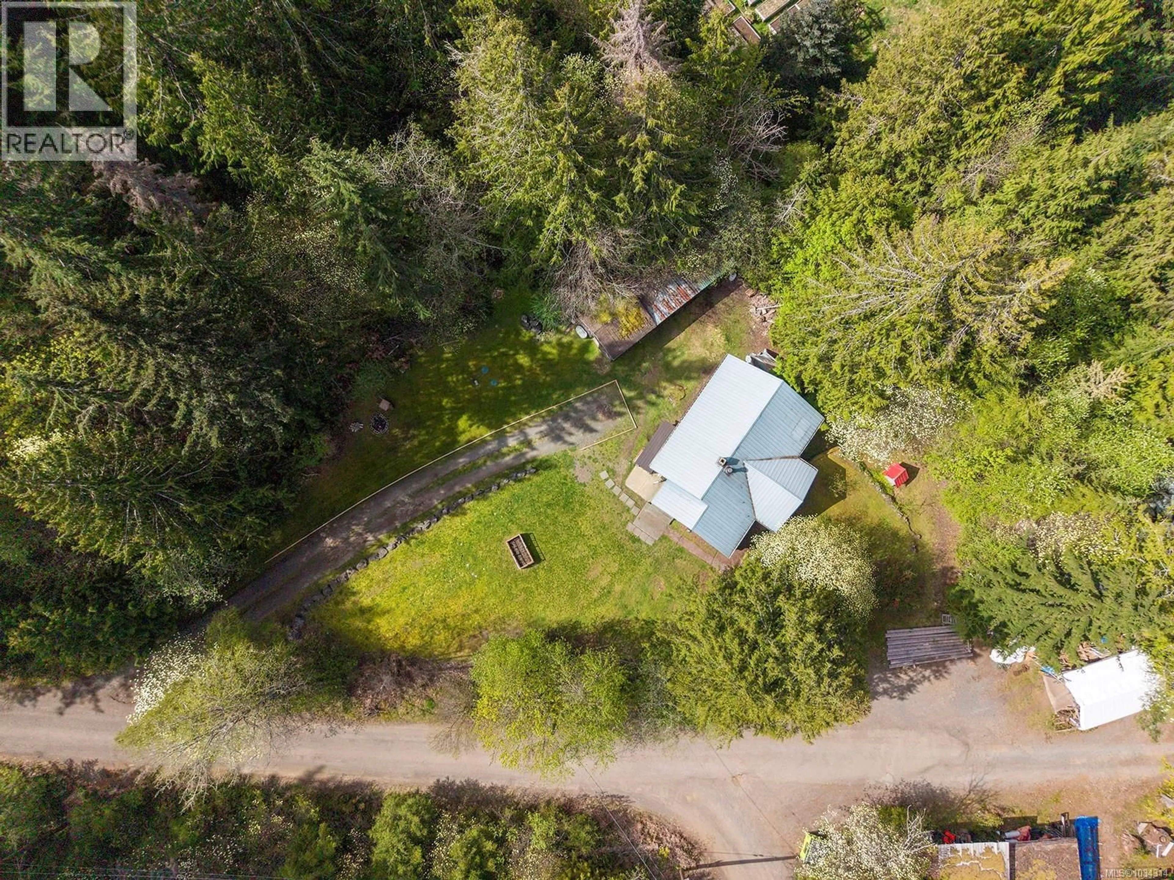 A pic from outside/outdoor area/front of a property/back of a property/a pic from drone, forest/trees view for 10 HORBURY ROAD, Cumberland British Columbia V0R1S0