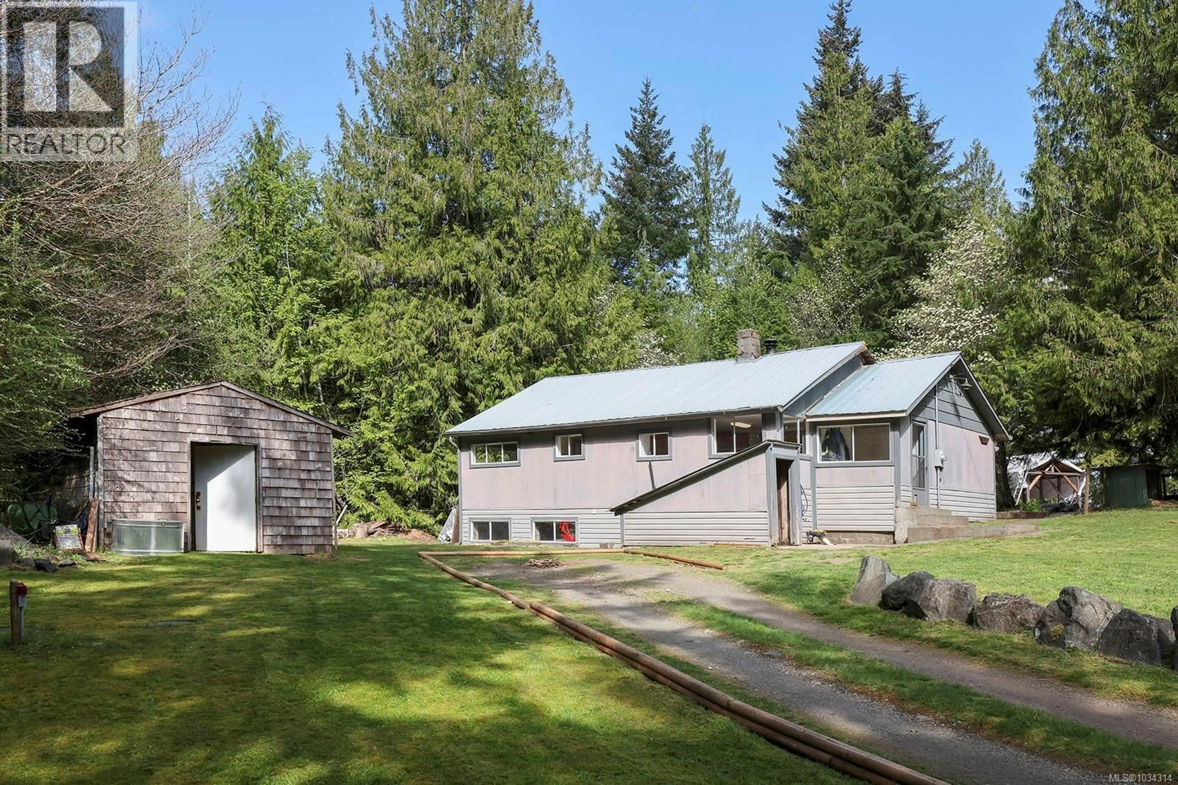 A pic from outside/outdoor area/front of a property/back of a property/a pic from drone, unknown for 10 HORBURY ROAD, Cumberland British Columbia V0R1S0