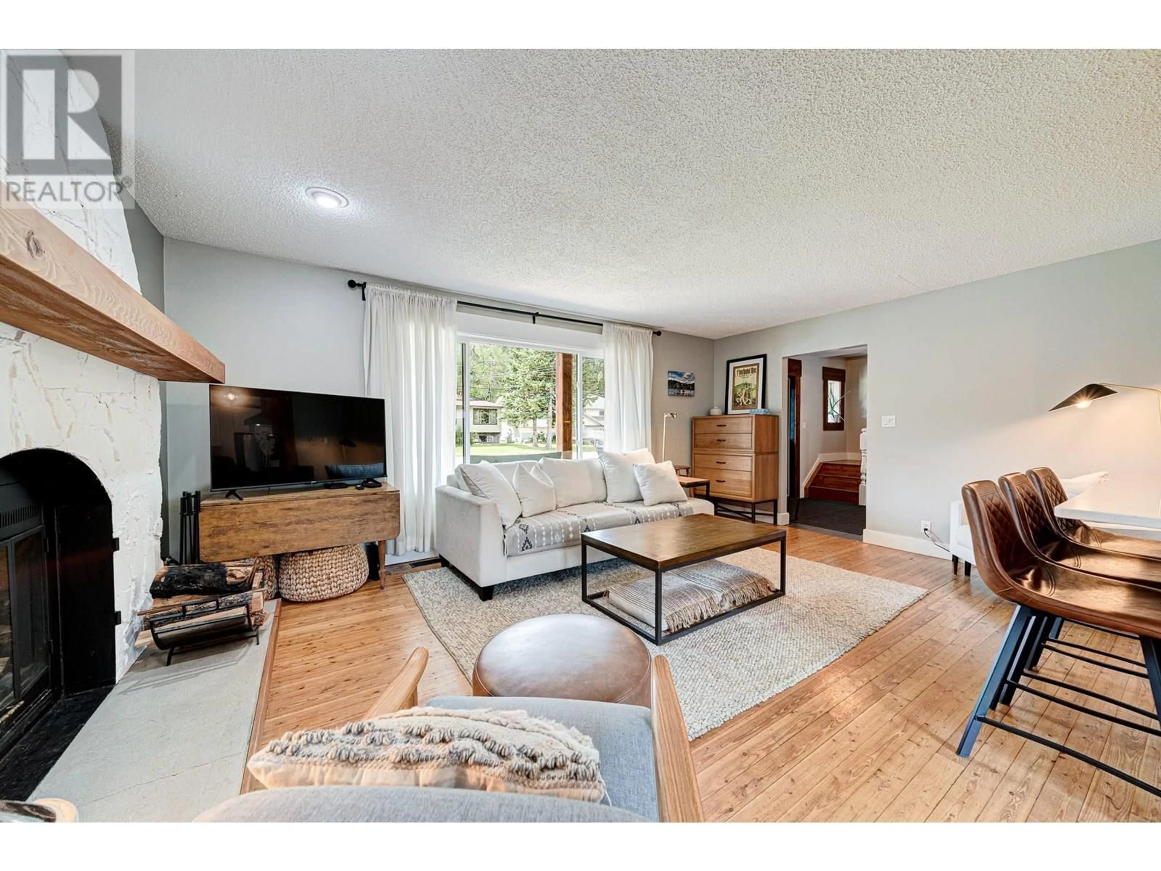 Living room with furniture, wood/laminate floor for 9 MT. PROCTOR AVENUE, Fernie British Columbia V0B1M3