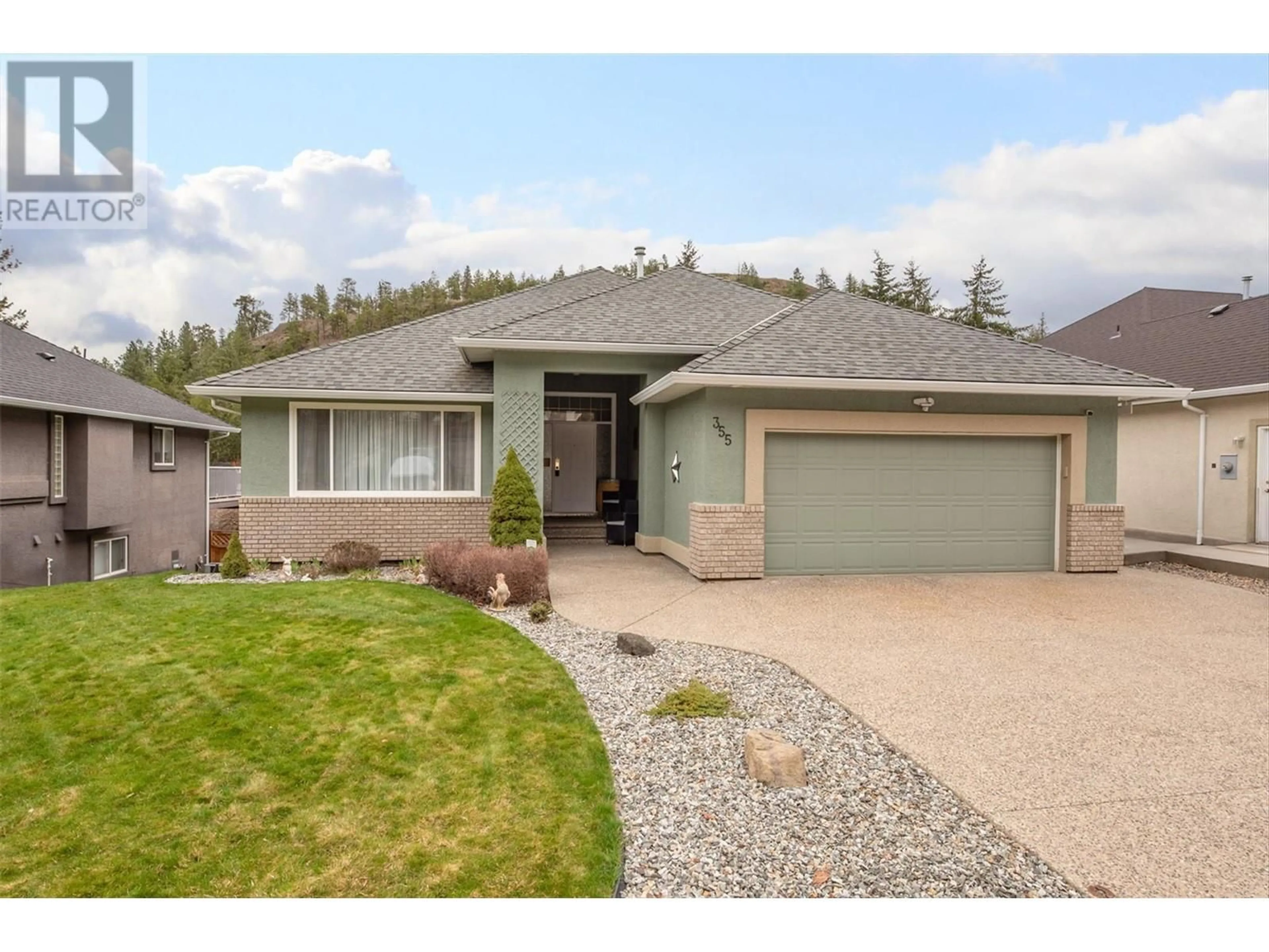 Home with vinyl exterior material, street for 355 WOODPARK CRESCENT, Kelowna British Columbia V1V2L4