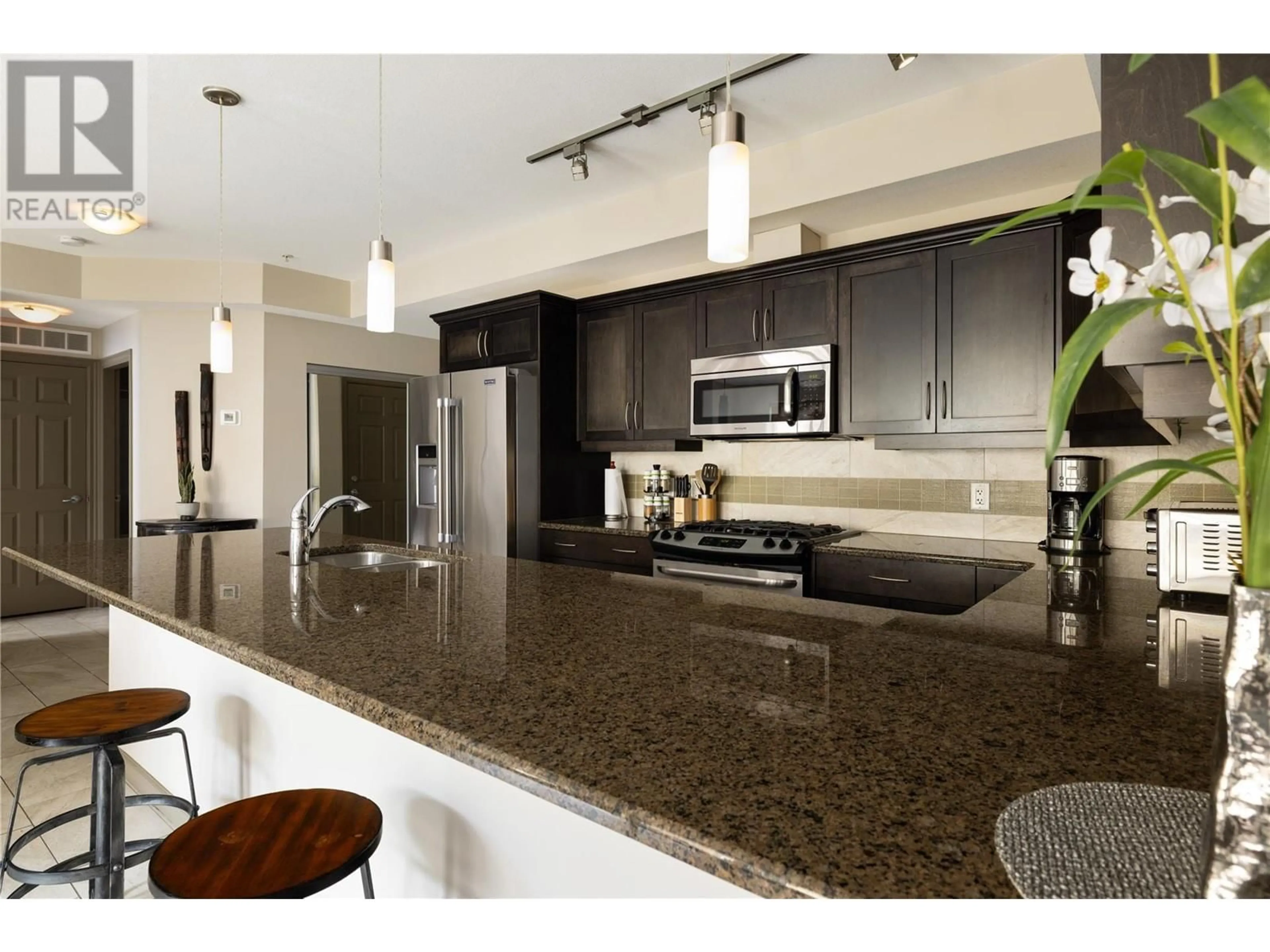 Open concept kitchen, unknown for 205 - 3589 SKAHA LAKE ROAD, Penticton British Columbia V2A7K2
