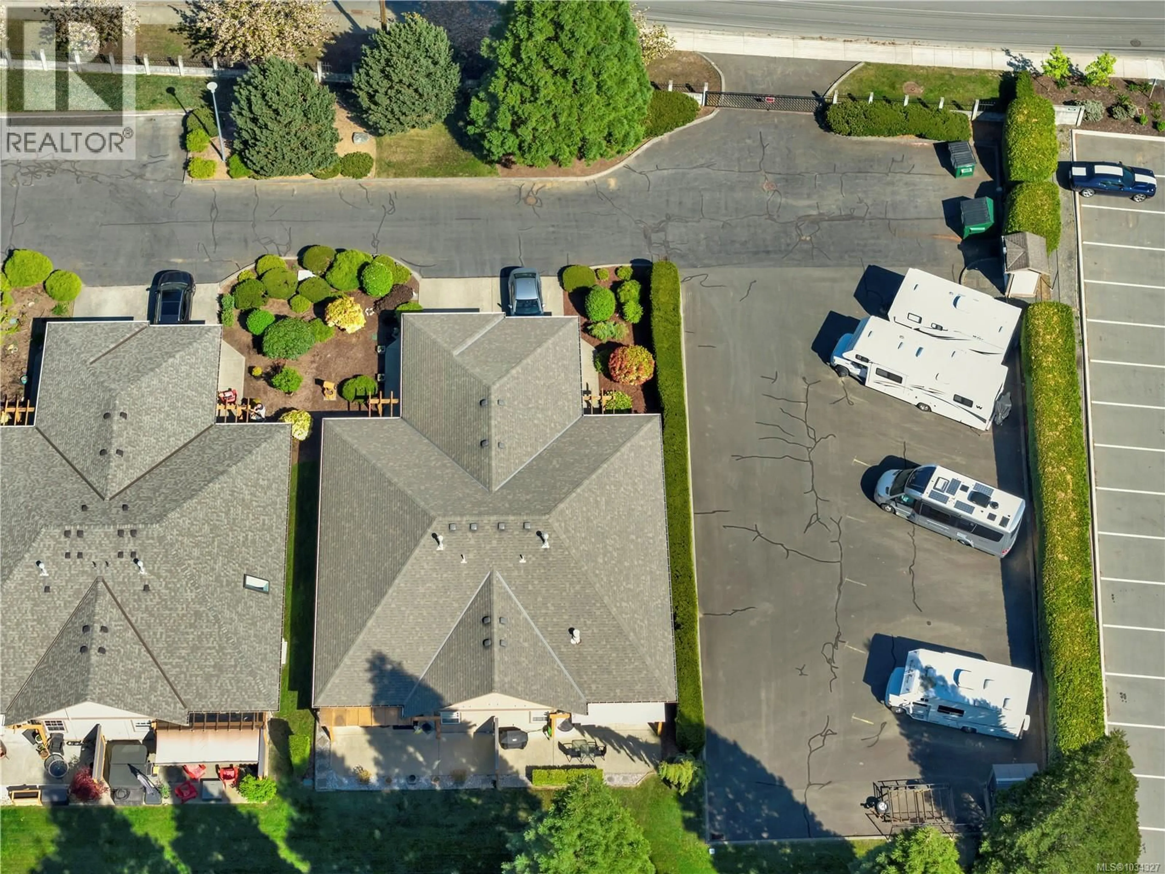 A pic from outside/outdoor area/front of a property/back of a property/a pic from drone, street for 760 MARGUERITE ROAD, Campbell River British Columbia V9W3K5