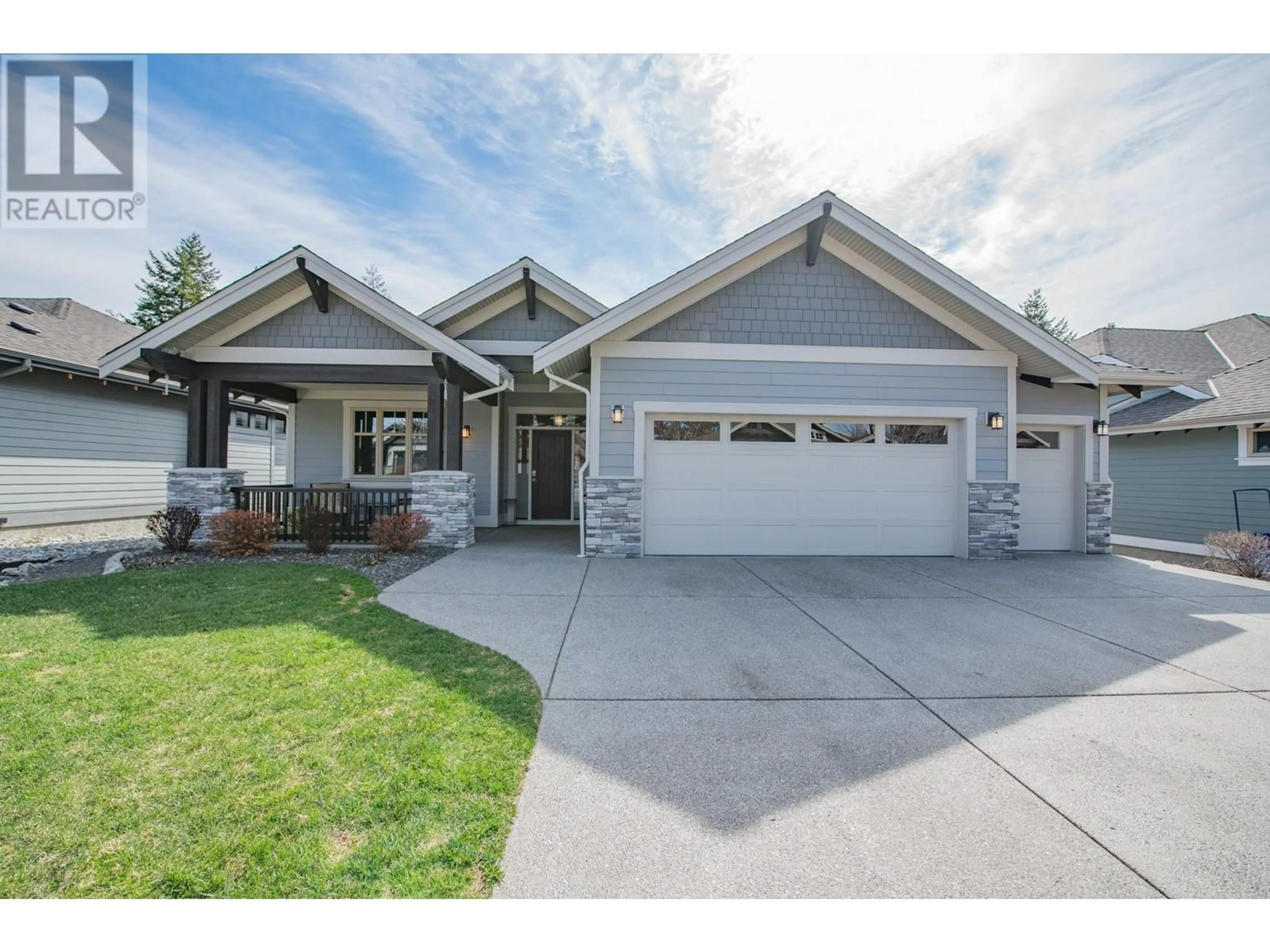 Home with vinyl exterior material, street for 433 LONGSPOON PLACE, Vernon British Columbia V1H2K2