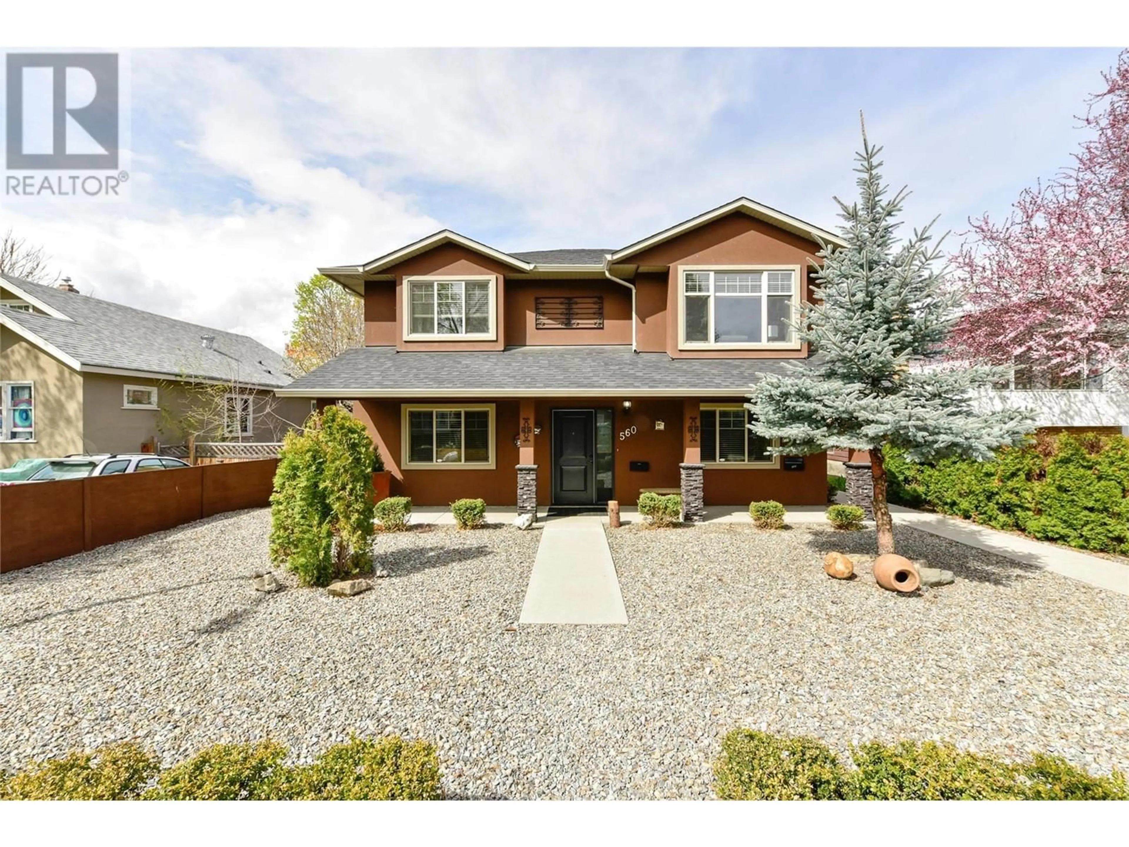 Home with brick exterior material, street for 560 CHRISTLETON AVENUE, Kelowna British Columbia V1Y5J2