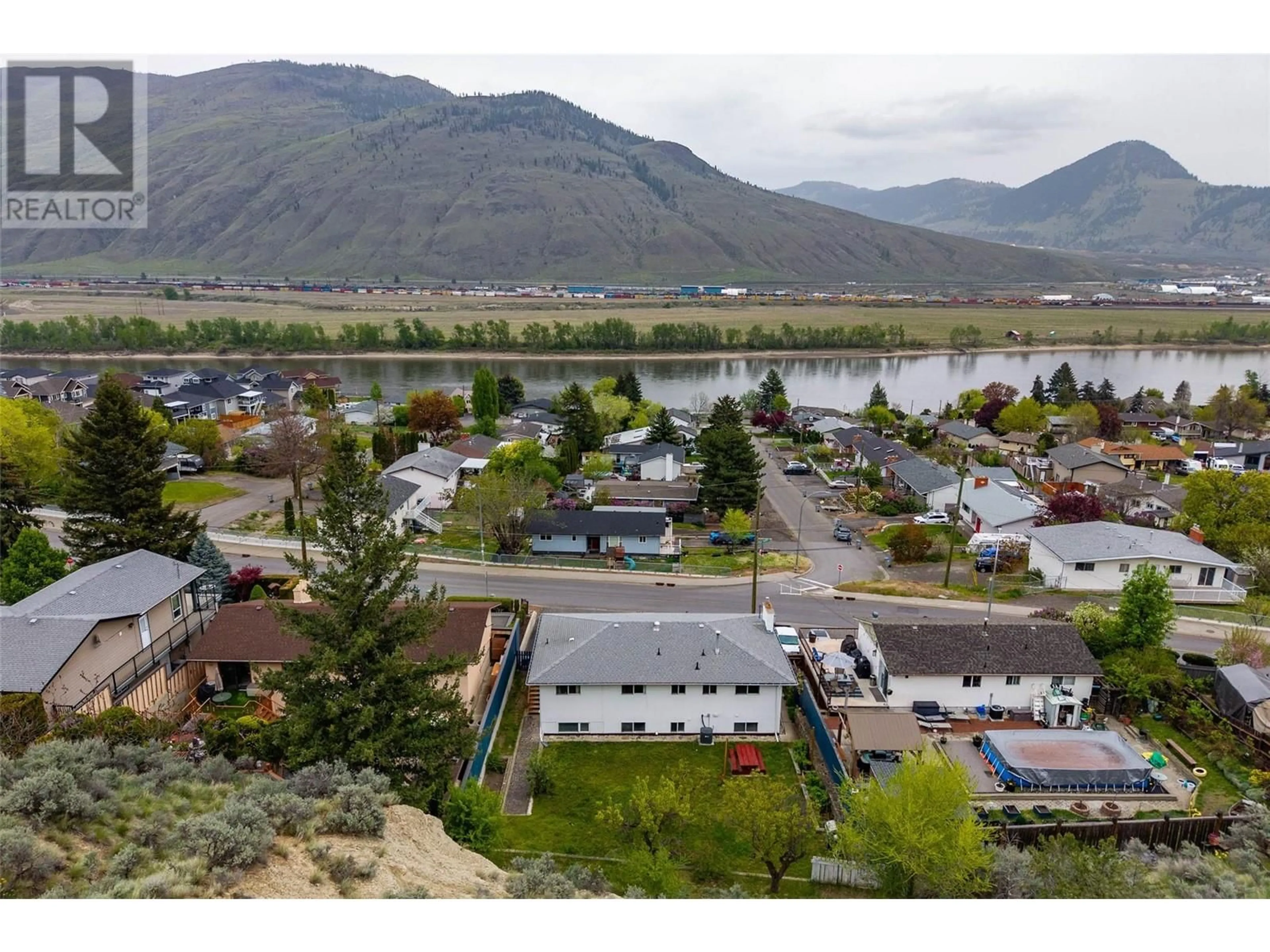 A pic from outside/outdoor area/front of a property/back of a property/a pic from drone, mountain view for 2203 GRASSLANDS BOULEVARD, Kamloops British Columbia V2B6E4
