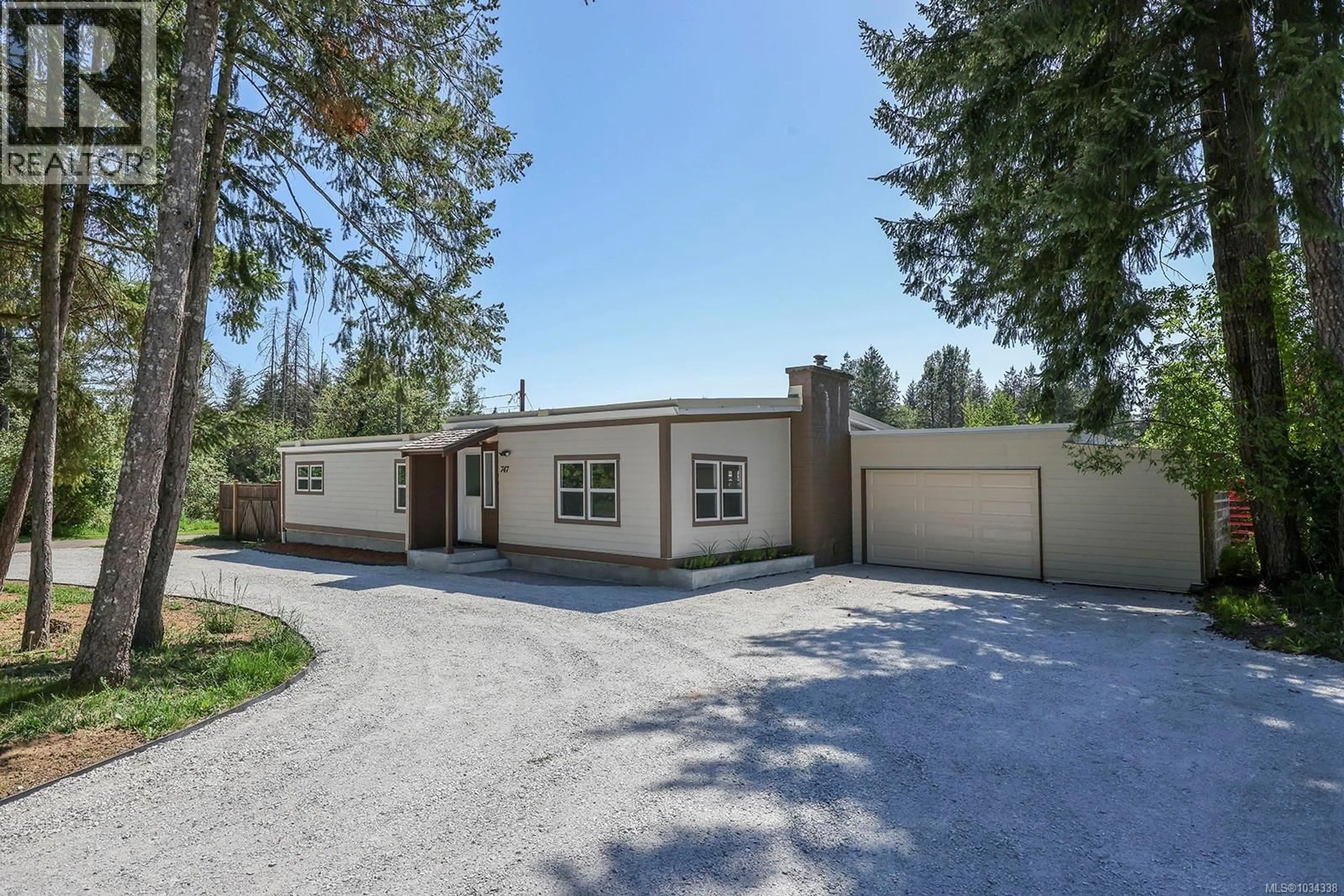A pic from outside/outdoor area/front of a property/back of a property/a pic from drone, street for 747 POWERHOUSE ROAD, Courtenay British Columbia V9N9L1