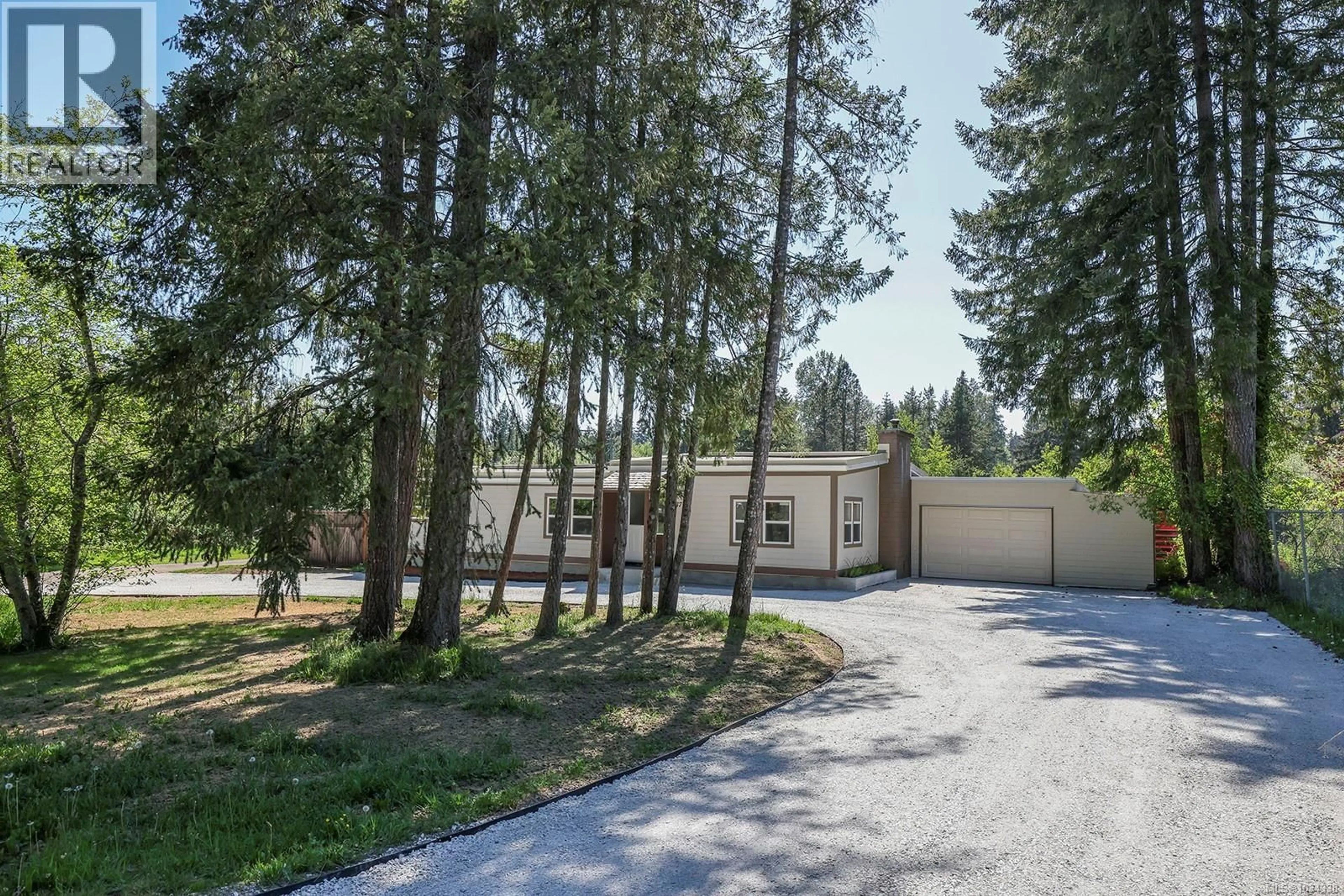 A pic from outside/outdoor area/front of a property/back of a property/a pic from drone, forest/trees view for 747 POWERHOUSE ROAD, Courtenay British Columbia V9N9L1