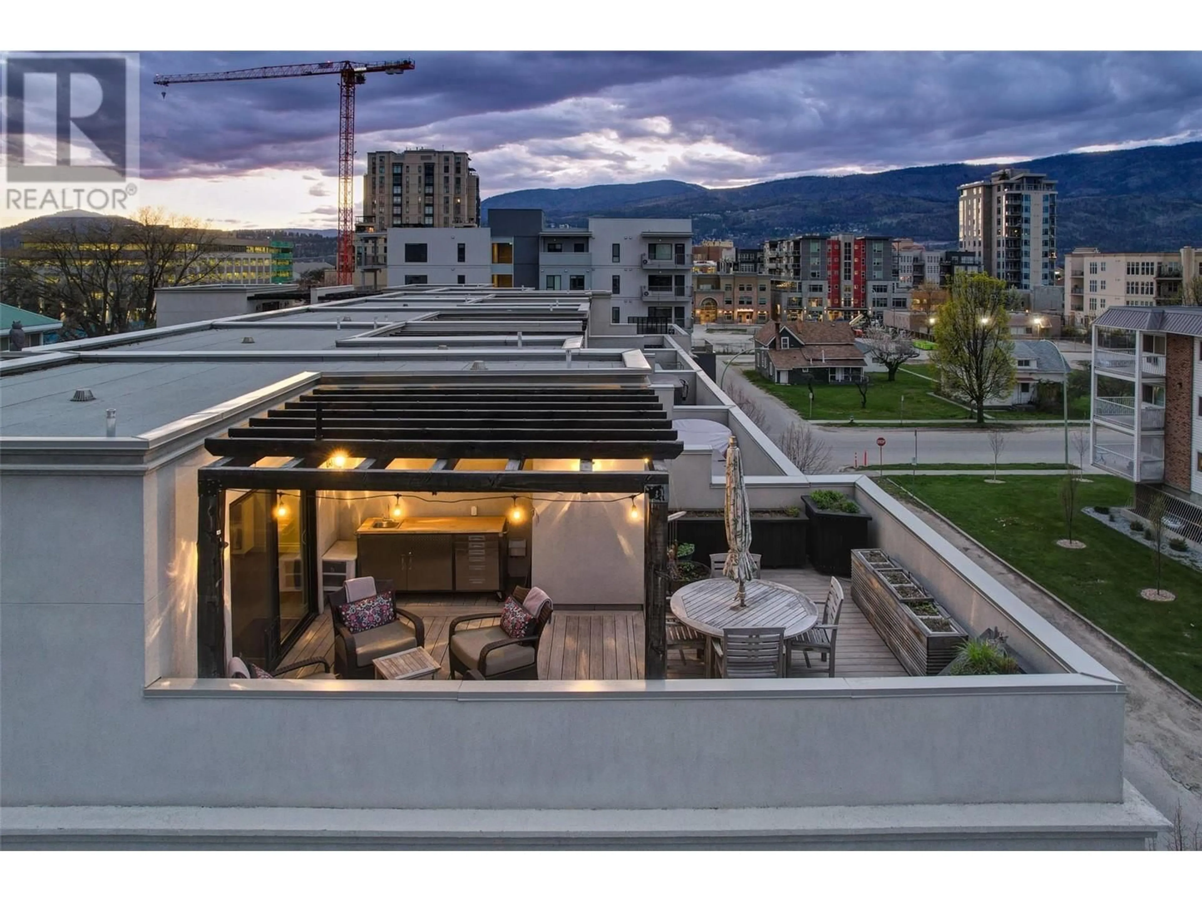 Patio, city buildings view from balcony for 645 FULLER AVENUE, Kelowna British Columbia V1Y2E9