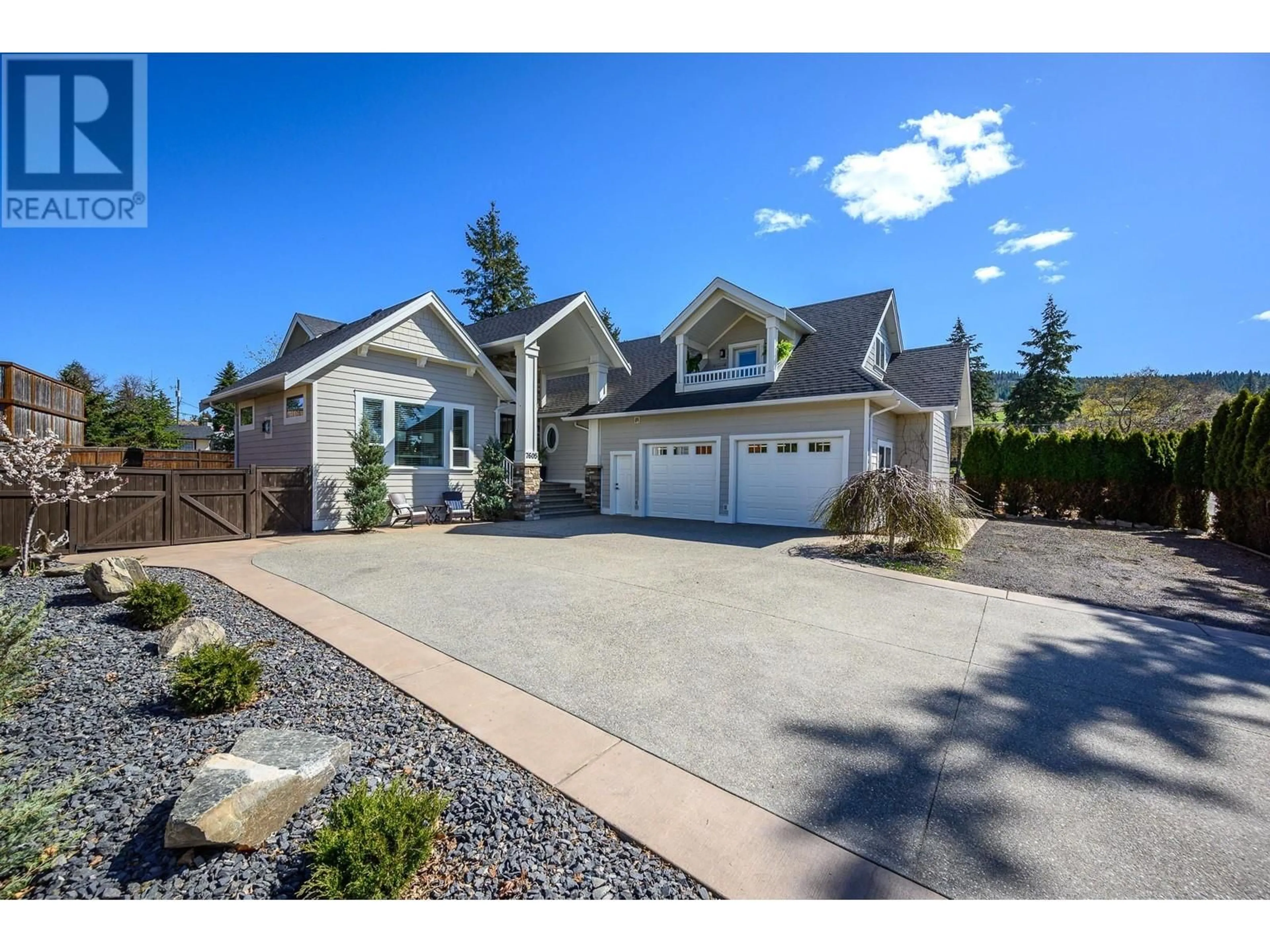 Home with vinyl exterior material, street for 7605 KIDSTON ROAD, Coldstream British Columbia V1B1S1