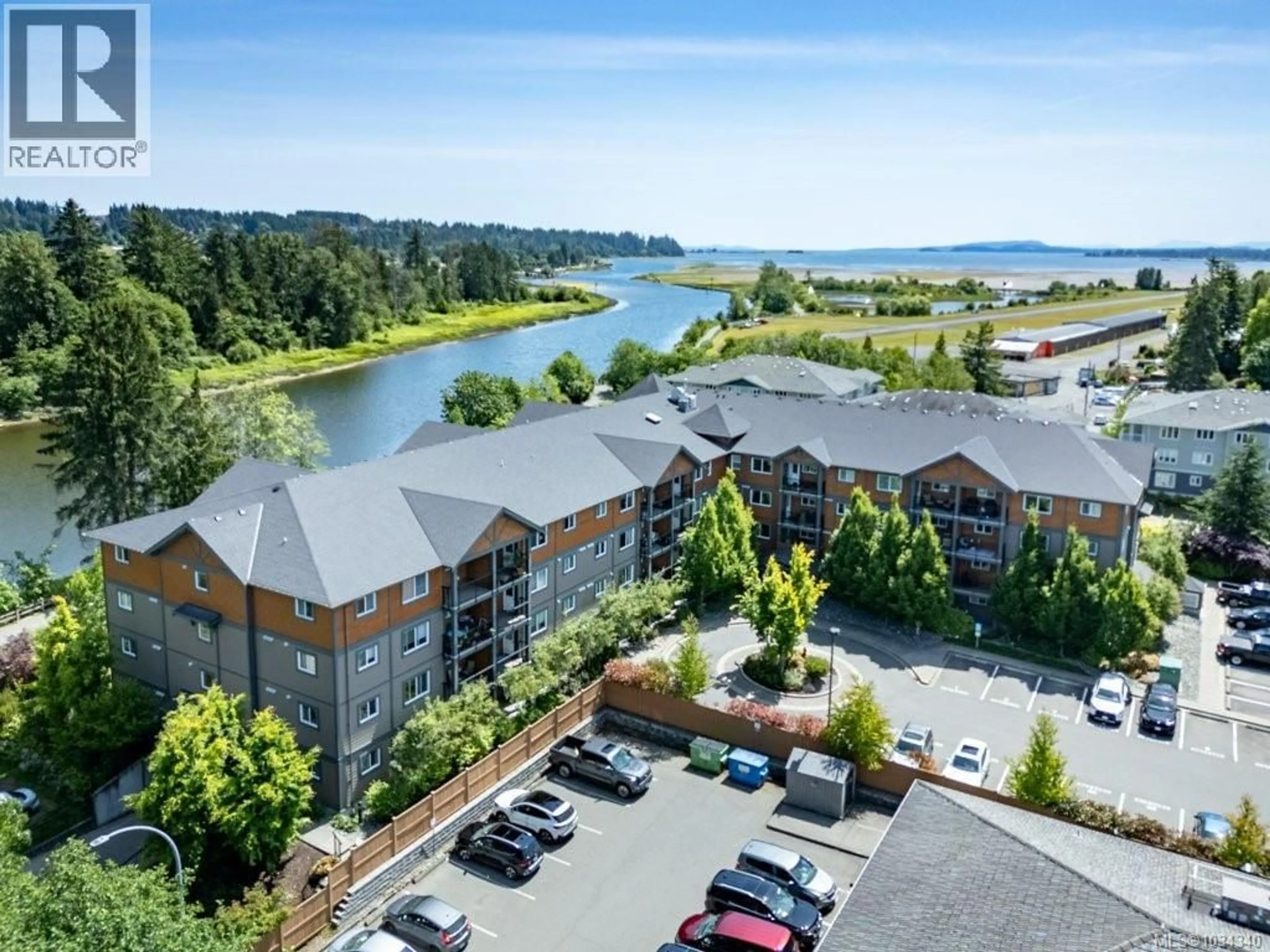 A pic from outside/outdoor area/front of a property/back of a property/a pic from drone, water/lake/river/ocean view for 409 - 1944 RIVERSIDE LANE, Courtenay British Columbia V9N0E5