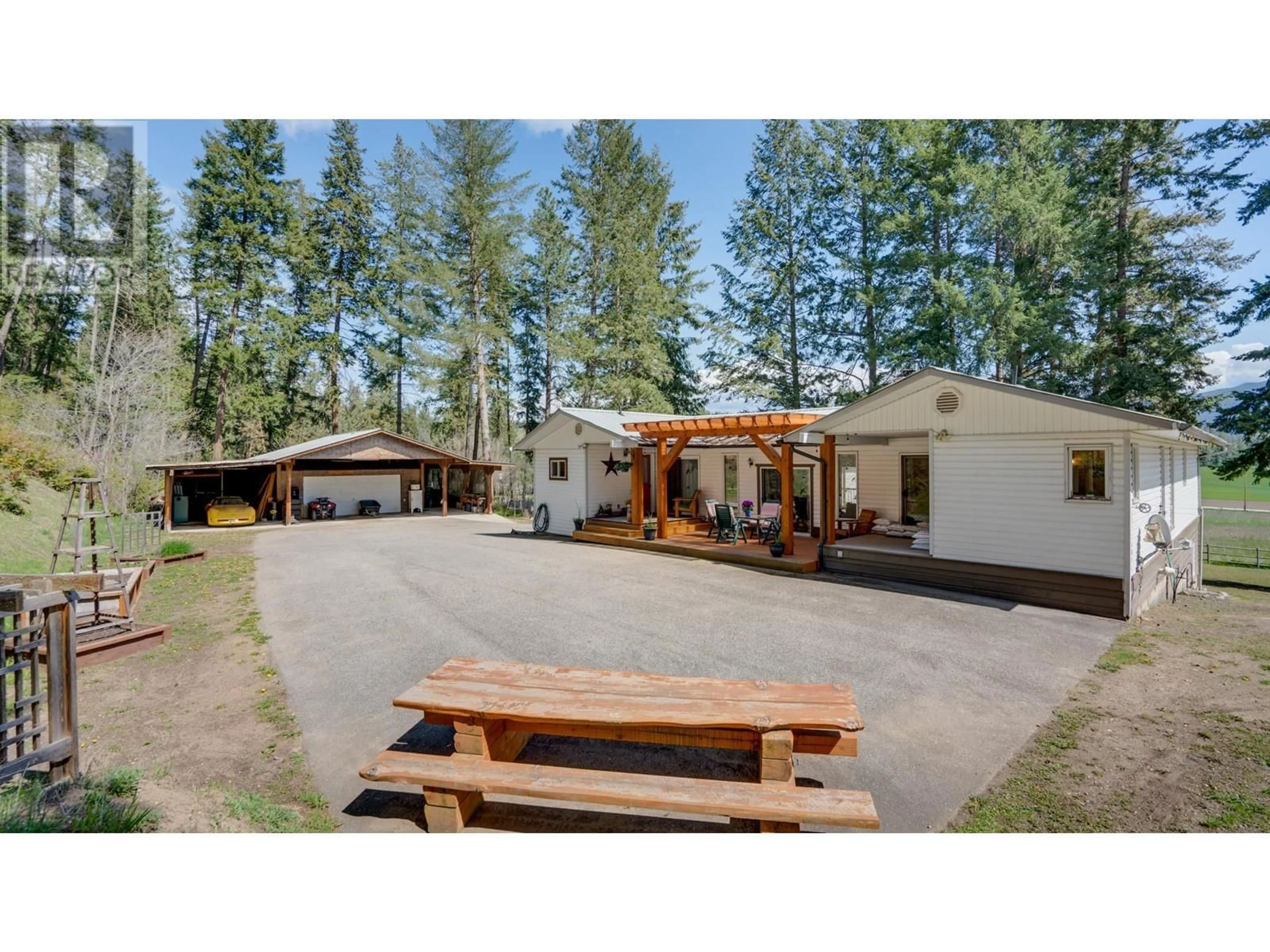 A pic from outside/outdoor area/front of a property/back of a property/a pic from drone, mountain view for 4851 LANSDOWNE ROAD, Spallumcheen British Columbia V0E1B4