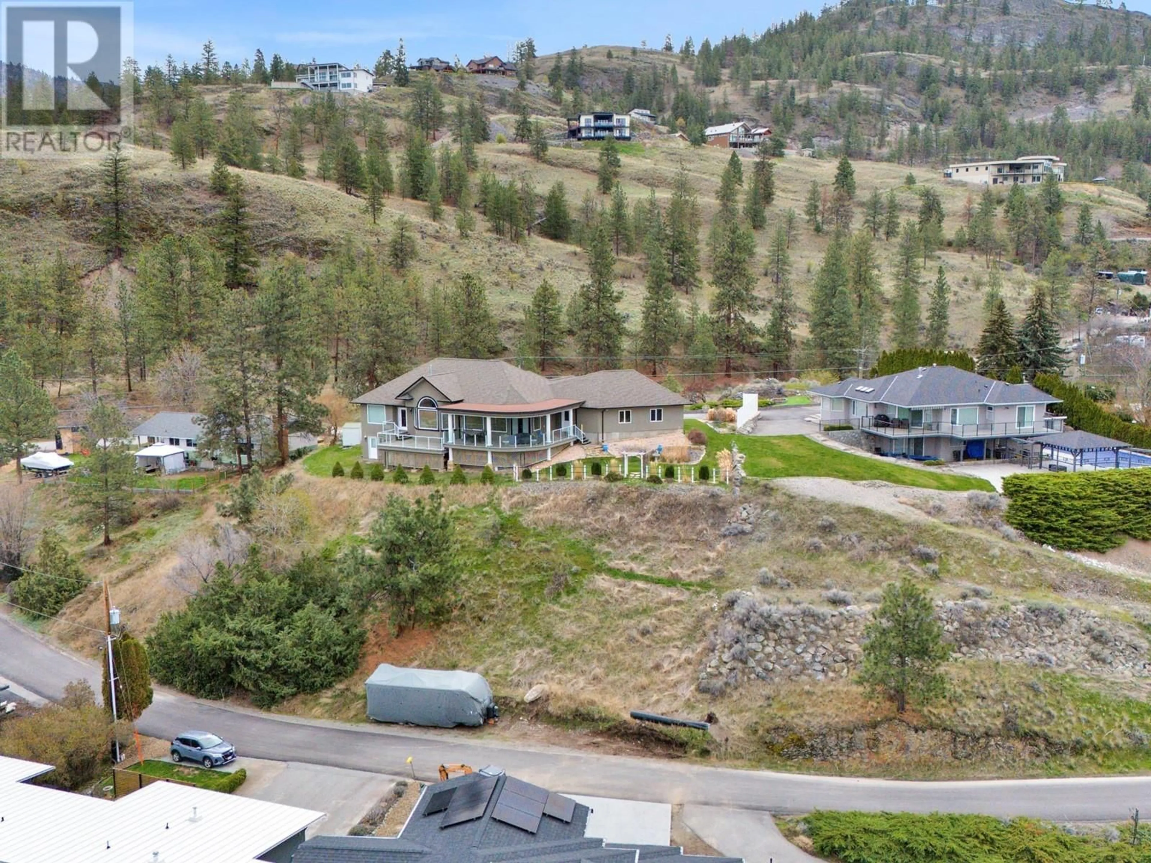 A pic from outside/outdoor area/front of a property/back of a property/a pic from drone, mountain view for 439 PANORAMA CRESCENT, Okanagan Falls British Columbia V0H1R5
