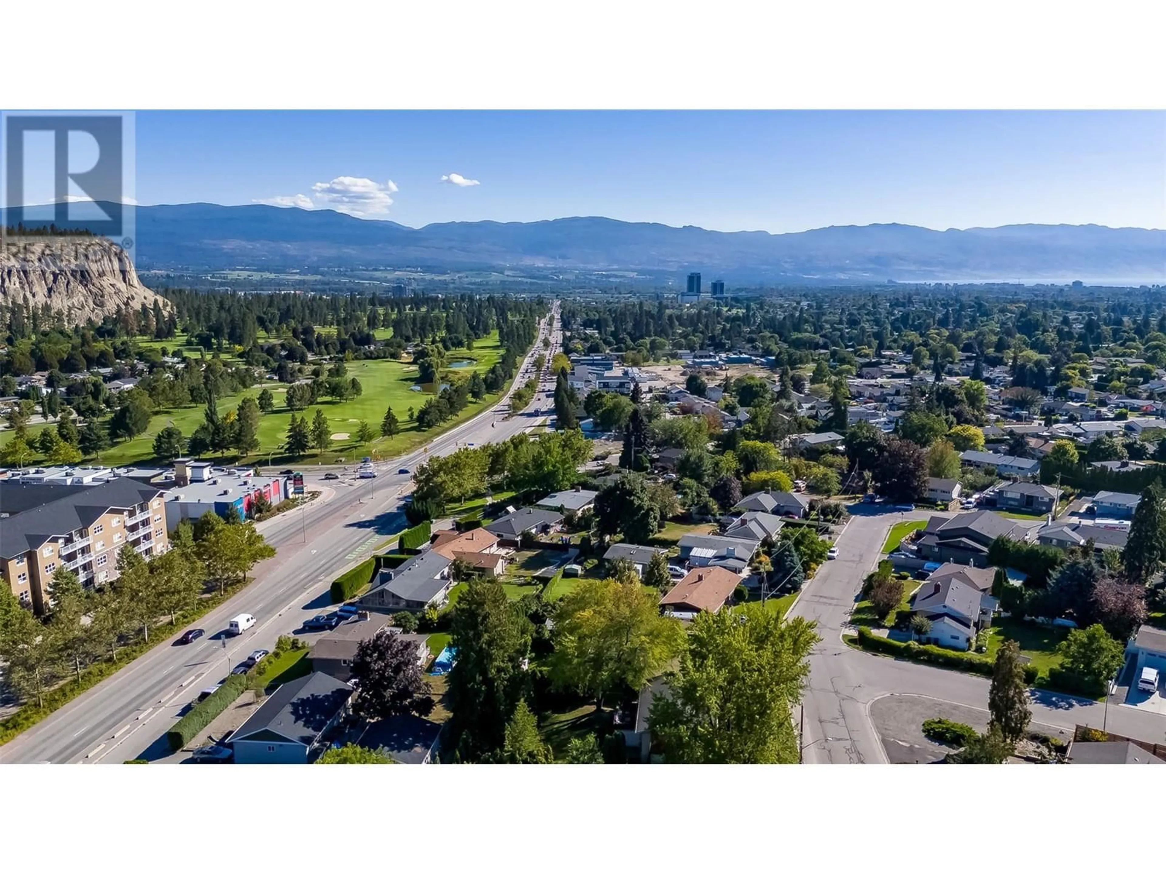 A pic from outside/outdoor area/front of a property/back of a property/a pic from drone, mountain view for 707 GLENBURN STREET, Kelowna British Columbia V1Y4G4