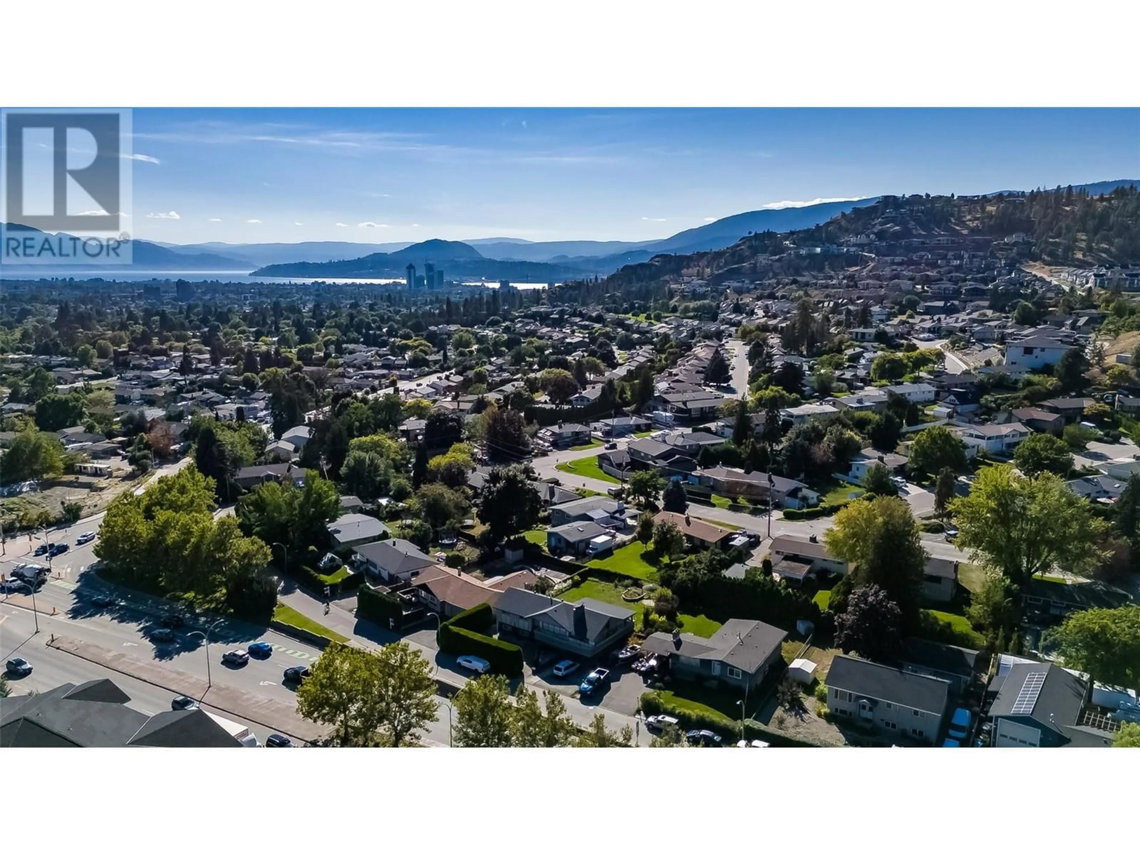 A pic from outside/outdoor area/front of a property/back of a property/a pic from drone, mountain view for 707 GLENBURN STREET, Kelowna British Columbia V1Y4G4