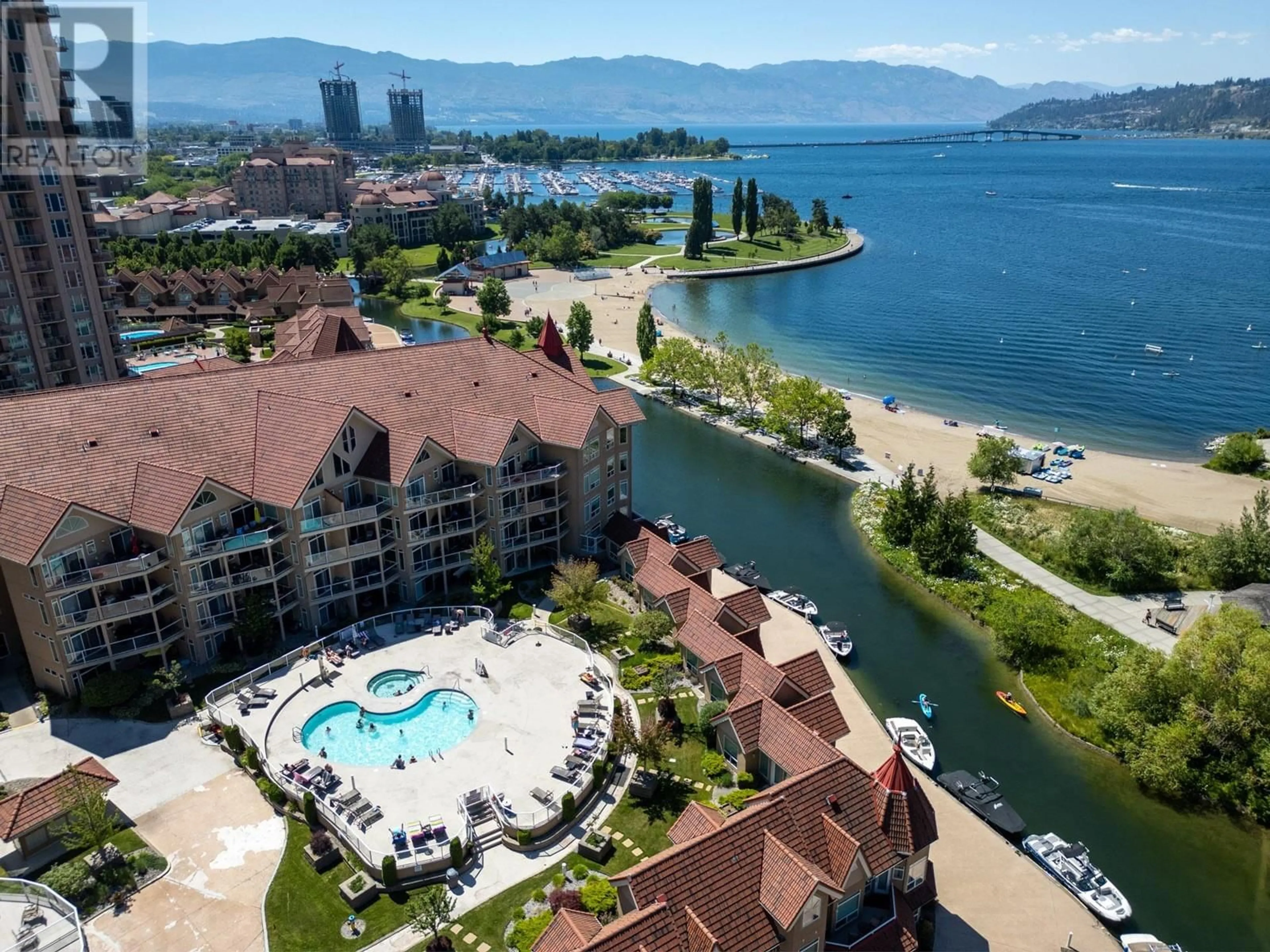 A pic from outside/outdoor area/front of a property/back of a property/a pic from drone, water/lake/river/ocean view for 244 - 1088 SUNSET DRIVE, Kelowna British Columbia V1Y9W1