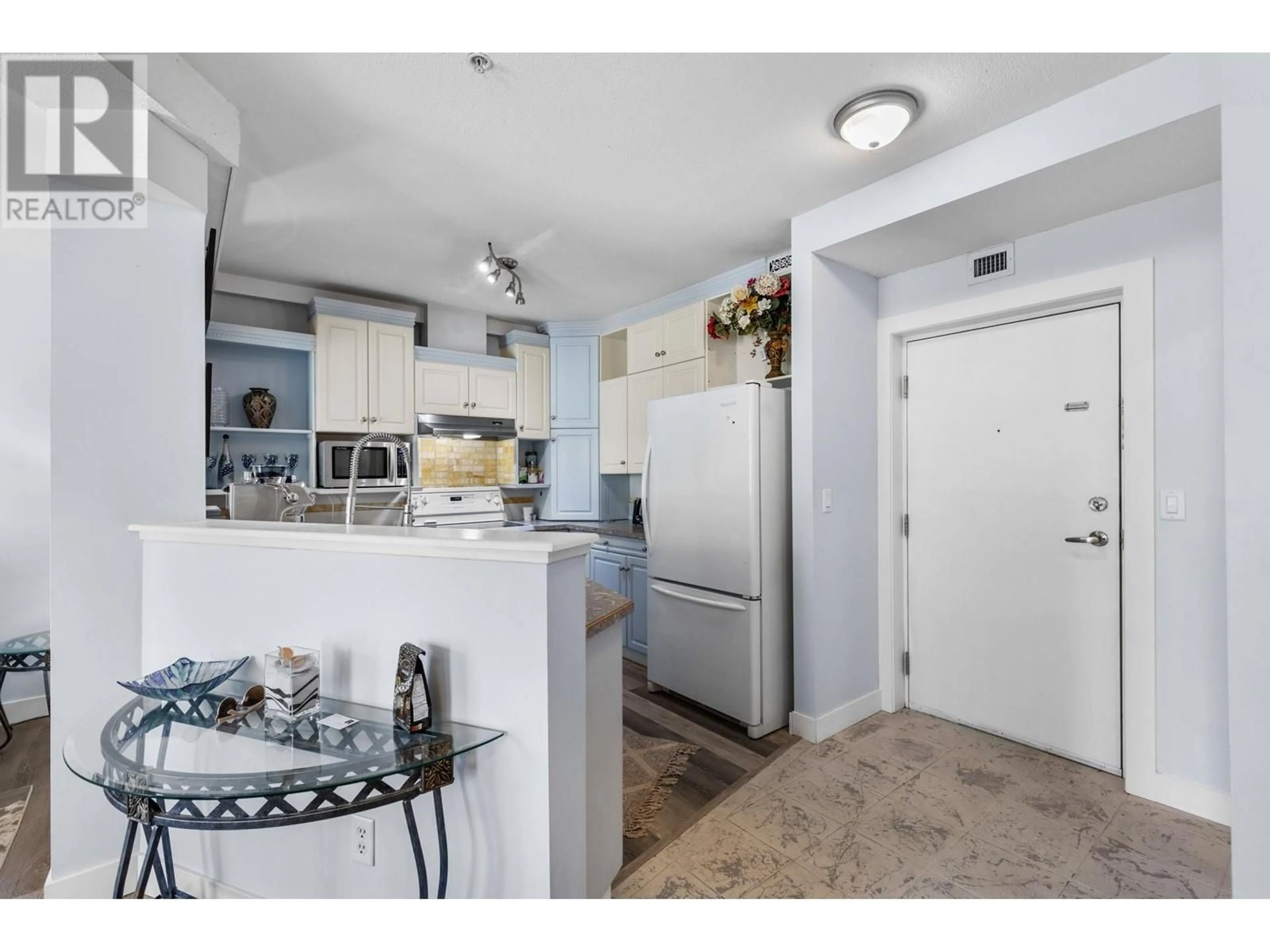 Standard kitchen, ceramic/tile floor for 244 - 1088 SUNSET DRIVE, Kelowna British Columbia V1Y9W1