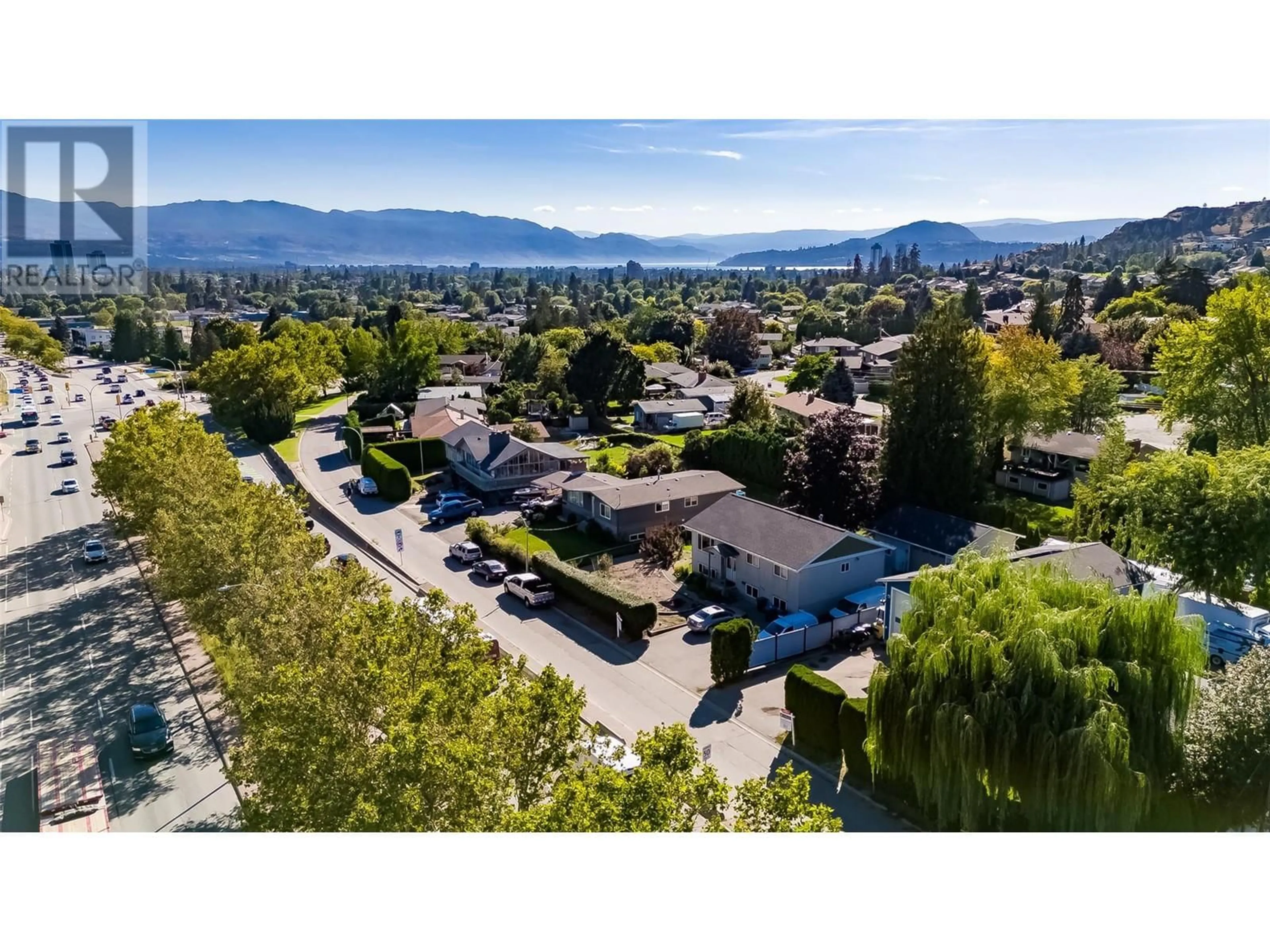 A pic from outside/outdoor area/front of a property/back of a property/a pic from drone, mountain view for 740 GLENMORE DRIVE, Kelowna British Columbia V1Y4N8