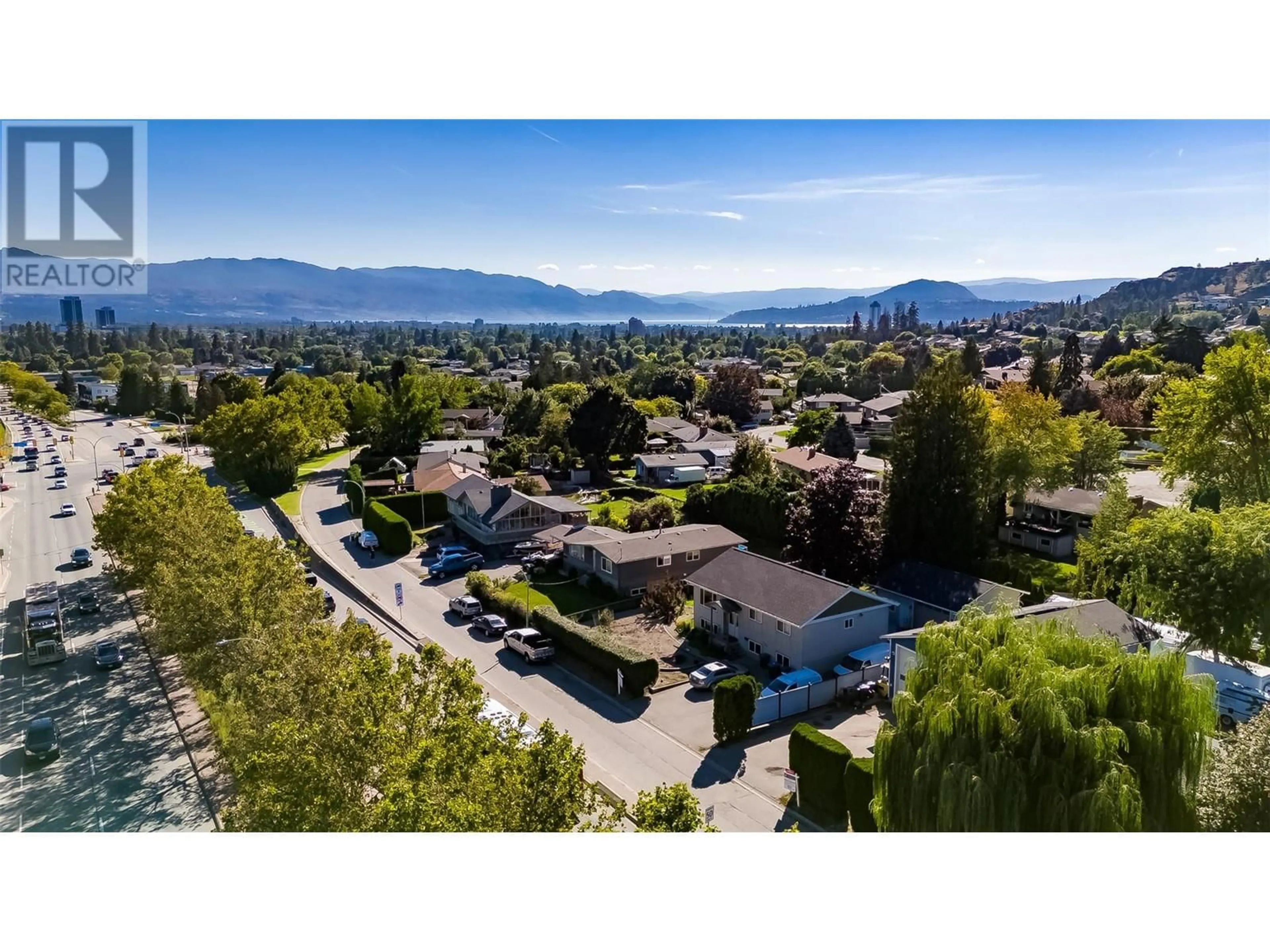 A pic from outside/outdoor area/front of a property/back of a property/a pic from drone, mountain view for 740 GLENMORE DRIVE, Kelowna British Columbia V1Y4N8