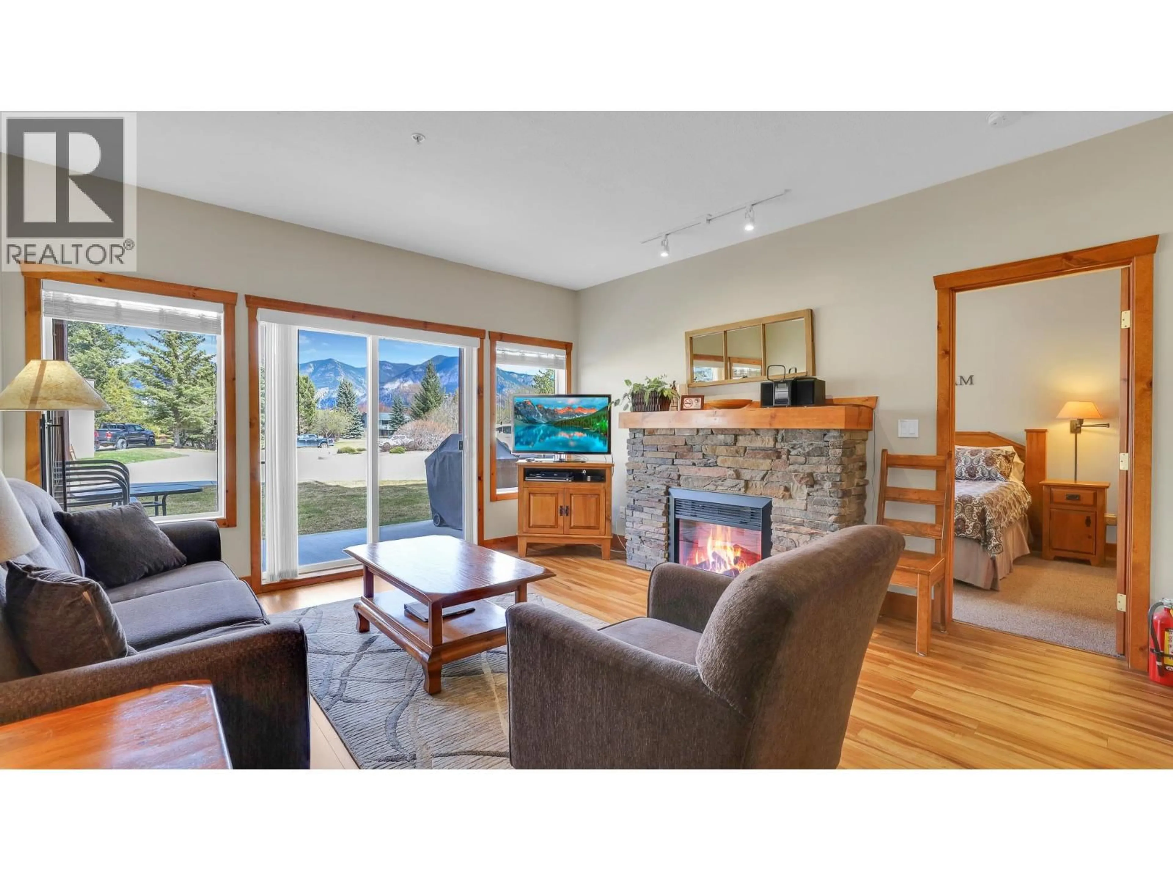 Living room with furniture, wood/laminate floor for 111H - 701 14A CRESCENT, Invermere British Columbia V0A1K0