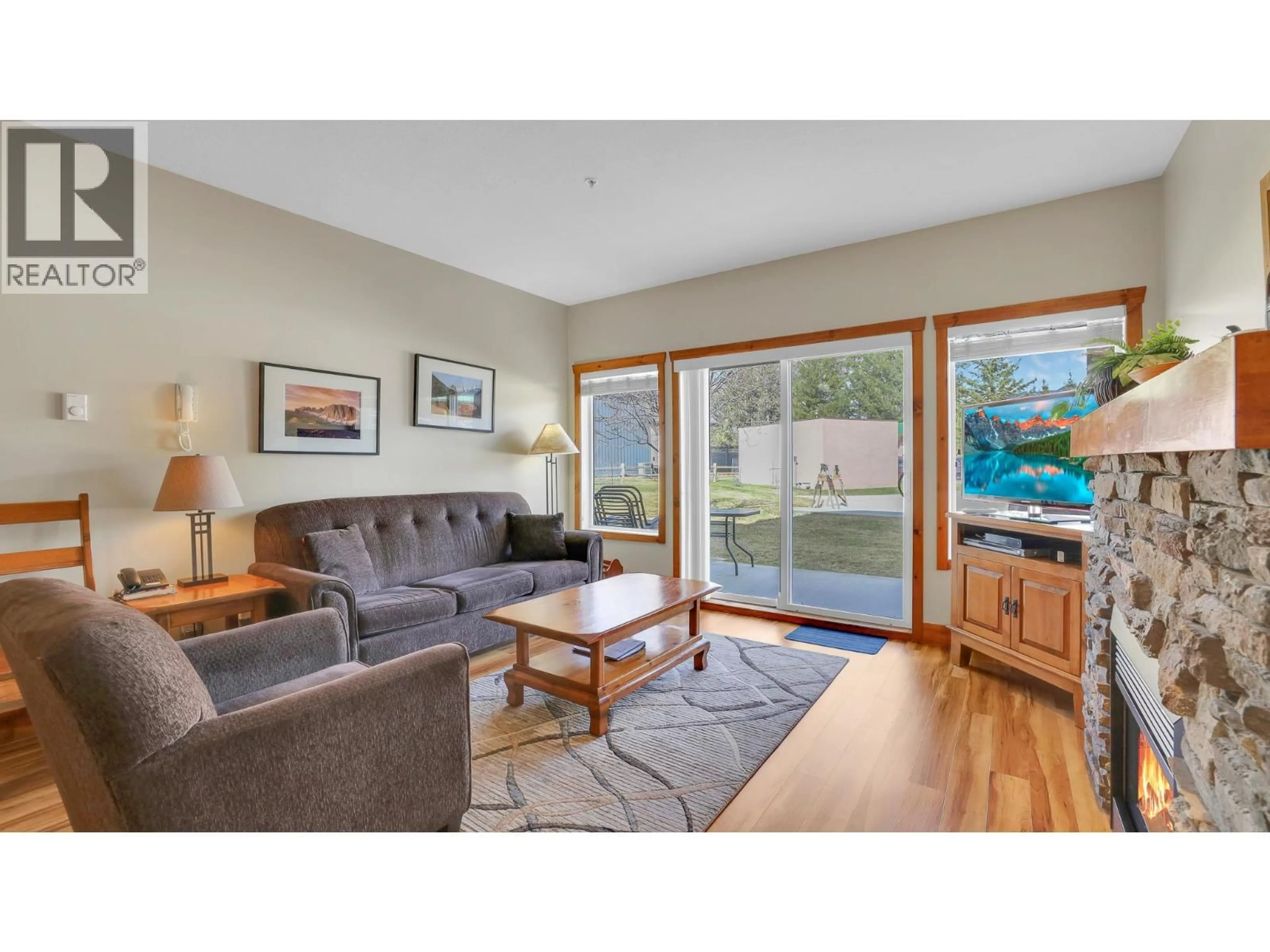 Living room with furniture, wood/laminate floor for 111H - 701 14A CRESCENT, Invermere British Columbia V0A1K0