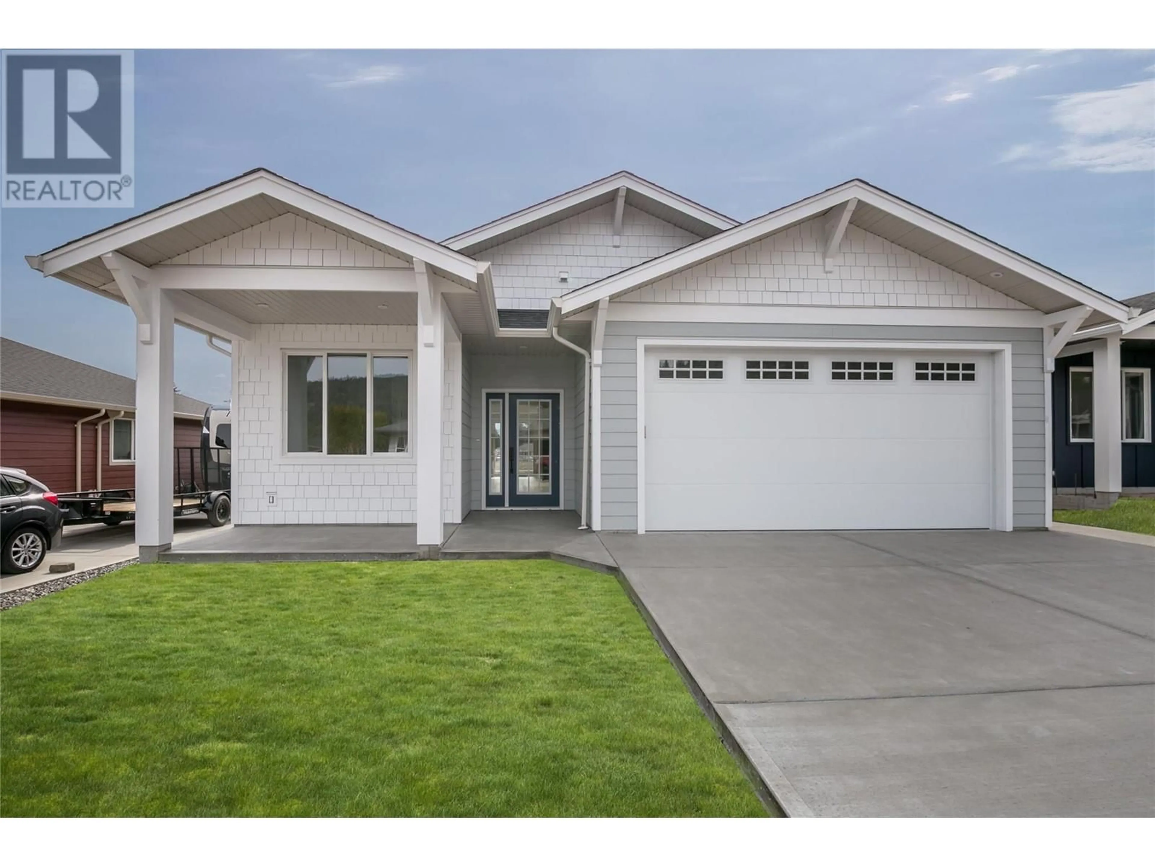 Home with vinyl exterior material, street for 575 MEADOWLARK AVENUE, Vernon British Columbia V1H2A1