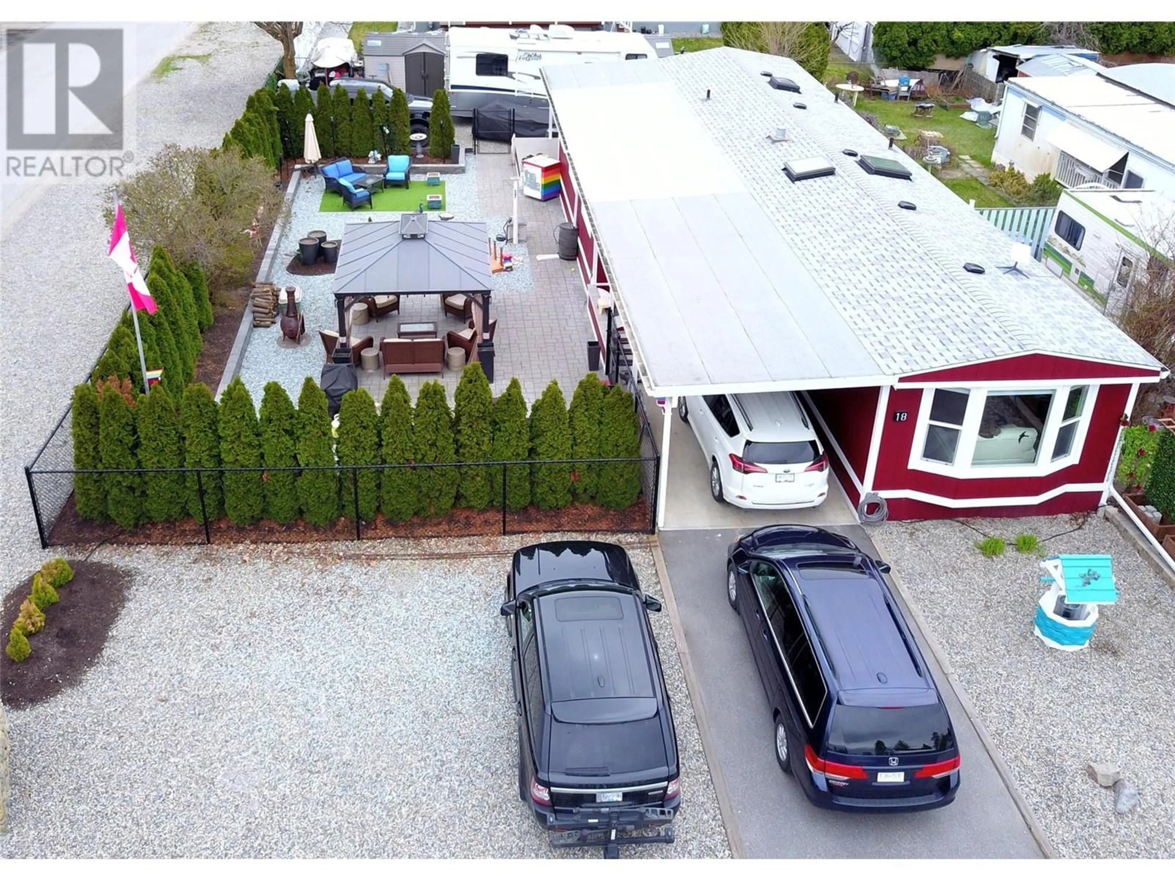 A pic from outside/outdoor area/front of a property/back of a property/a pic from drone, street for 18 - 1302 CEDAR STREET, Okanagan Falls British Columbia V0H1R4
