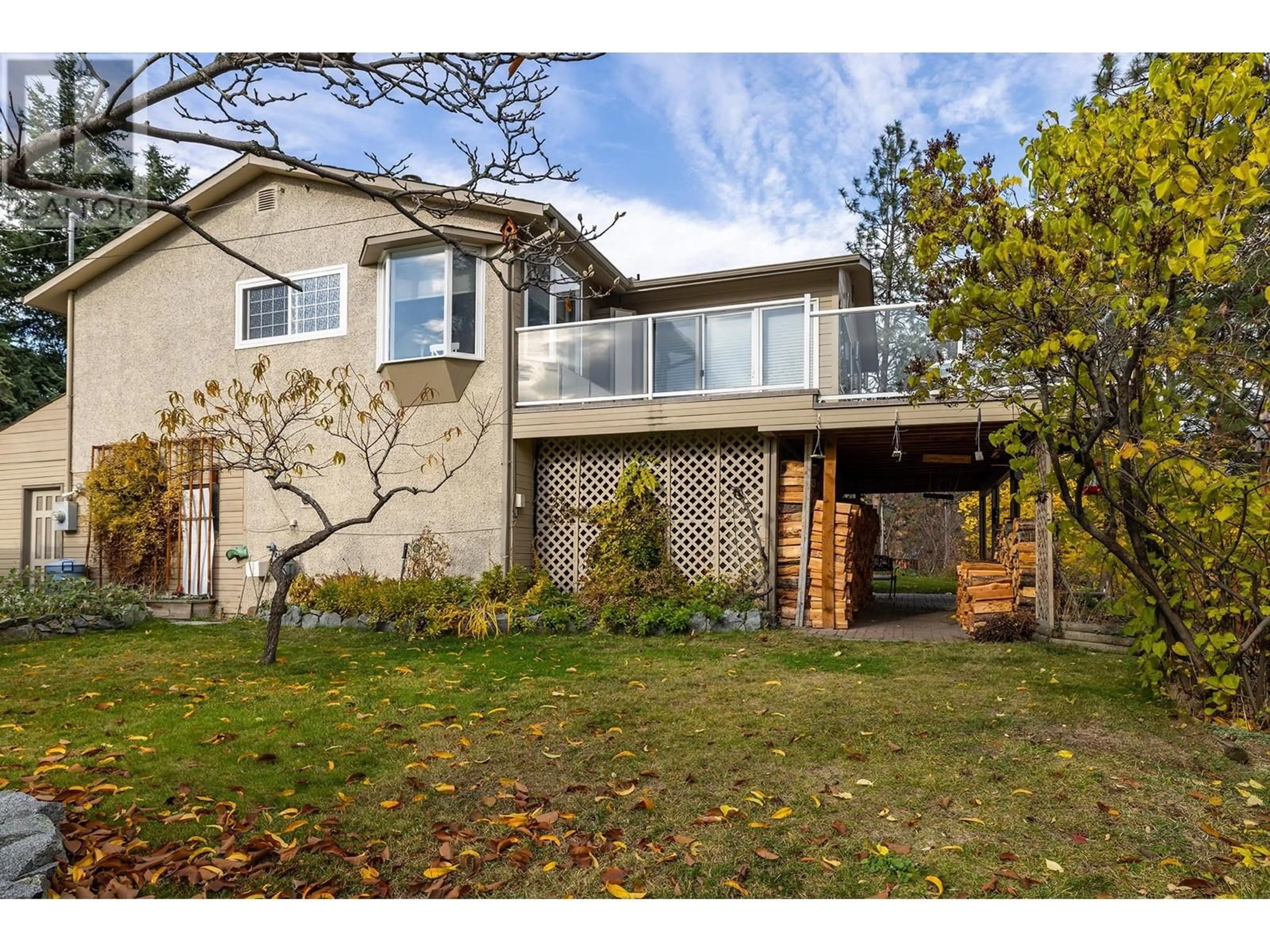 A pic from outside/outdoor area/front of a property/back of a property/a pic from drone, street for 3663 INVERNESS ROAD, West Kelowna British Columbia V4T1J5