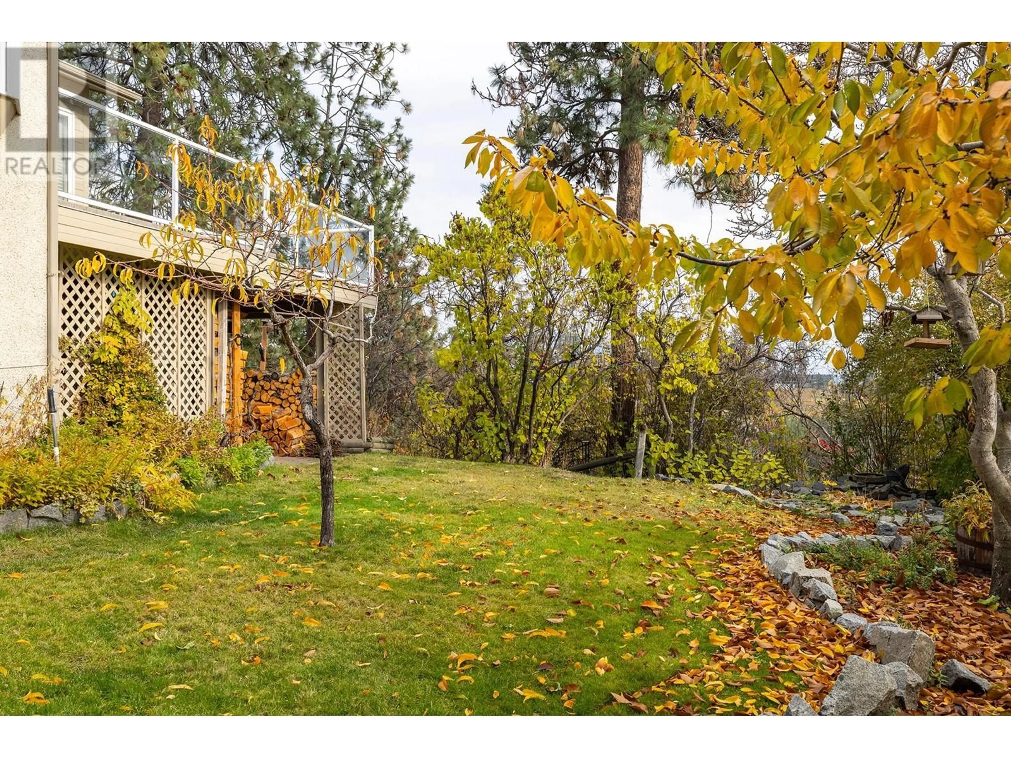 A pic from outside/outdoor area/front of a property/back of a property/a pic from drone, forest/trees view for 3663 INVERNESS ROAD, West Kelowna British Columbia V4T1J5