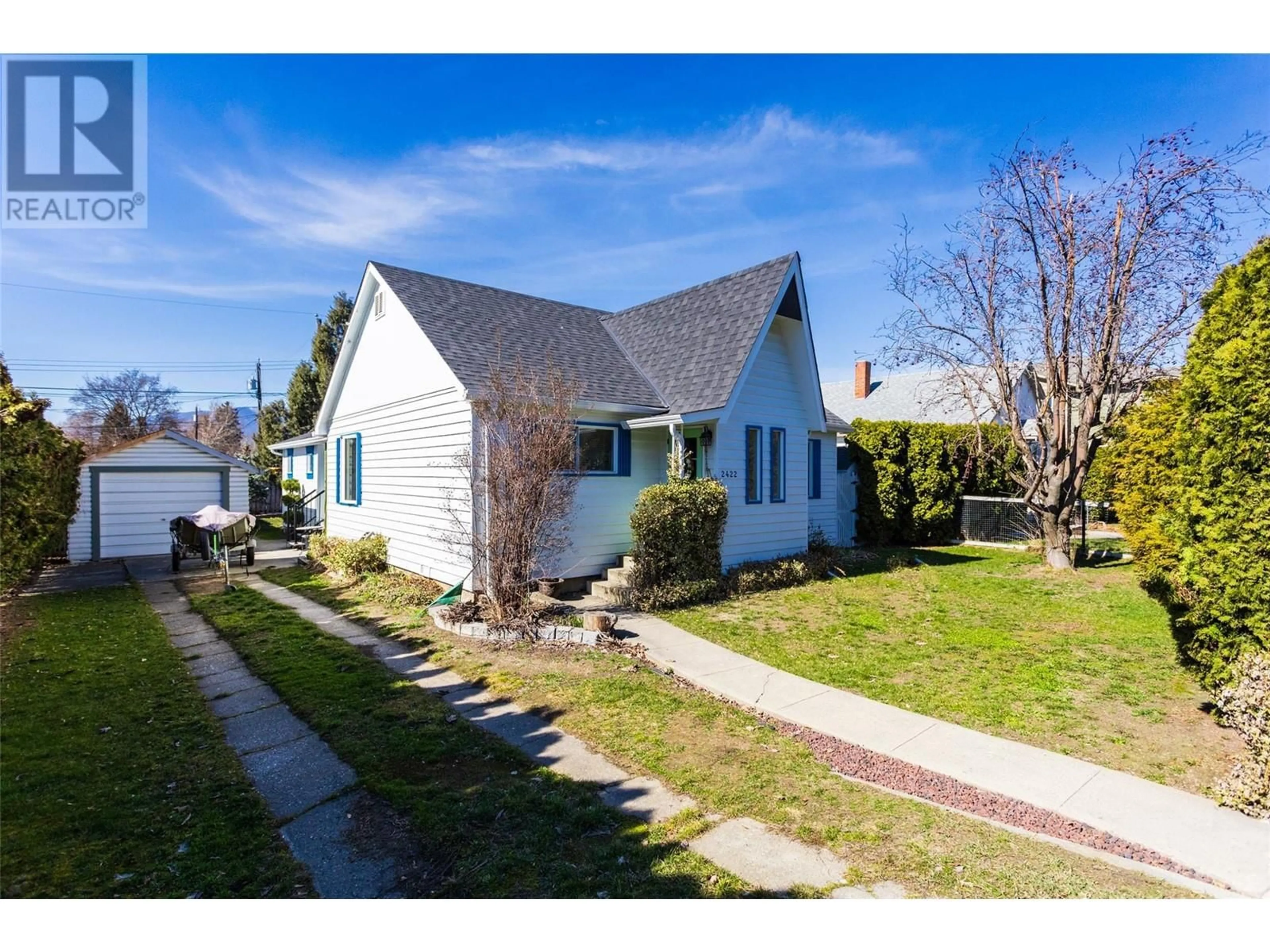 A pic from outside/outdoor area/front of a property/back of a property/a pic from drone, street for 2422 RICHTER STREET, Kelowna British Columbia V1Y2P6