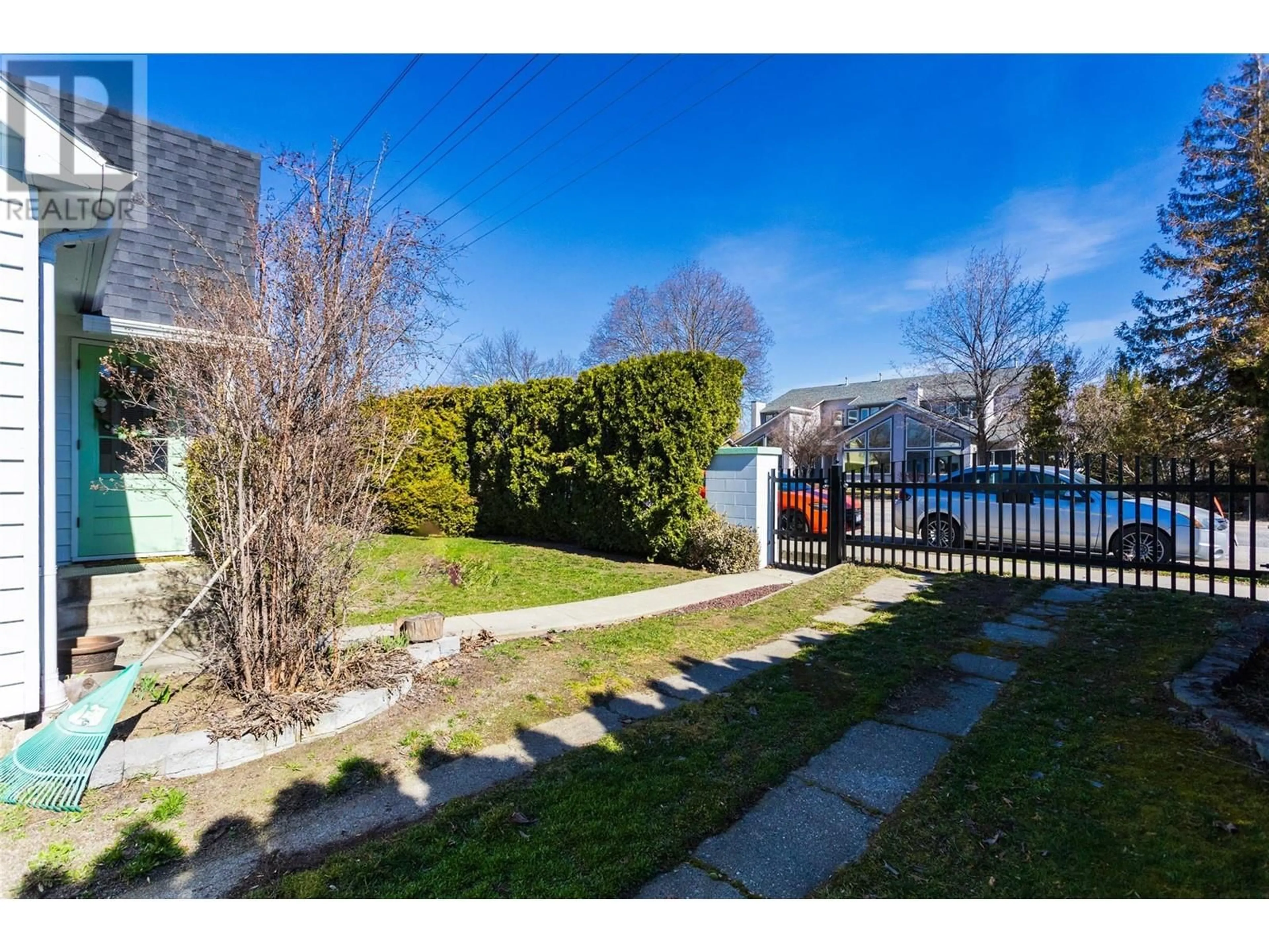 A pic from outside/outdoor area/front of a property/back of a property/a pic from drone, street for 2422 RICHTER STREET, Kelowna British Columbia V1Y2P6