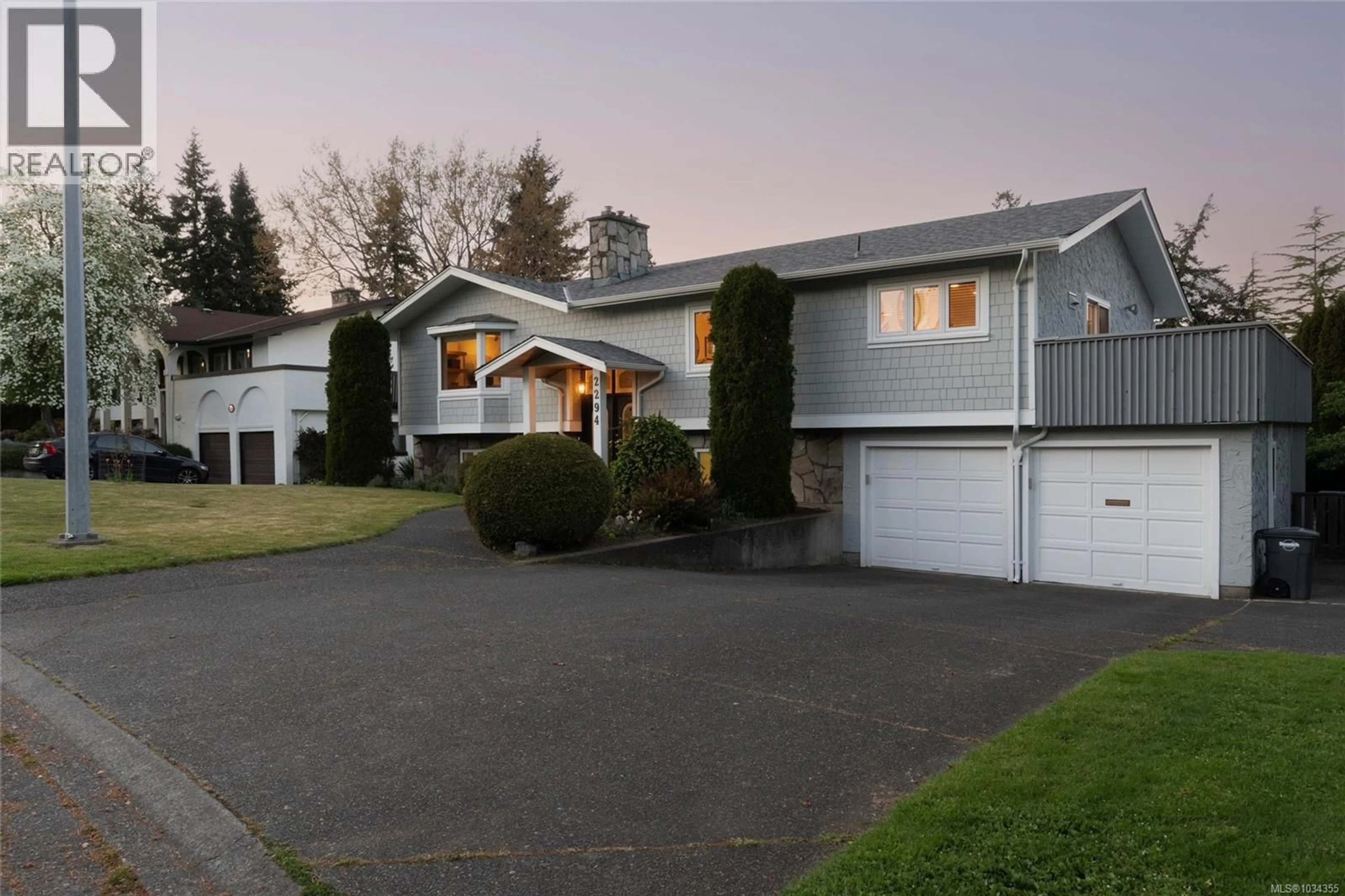 Home with vinyl exterior material, street for 2294 GREENLANDS ROAD, Saanich British Columbia V8N4T4