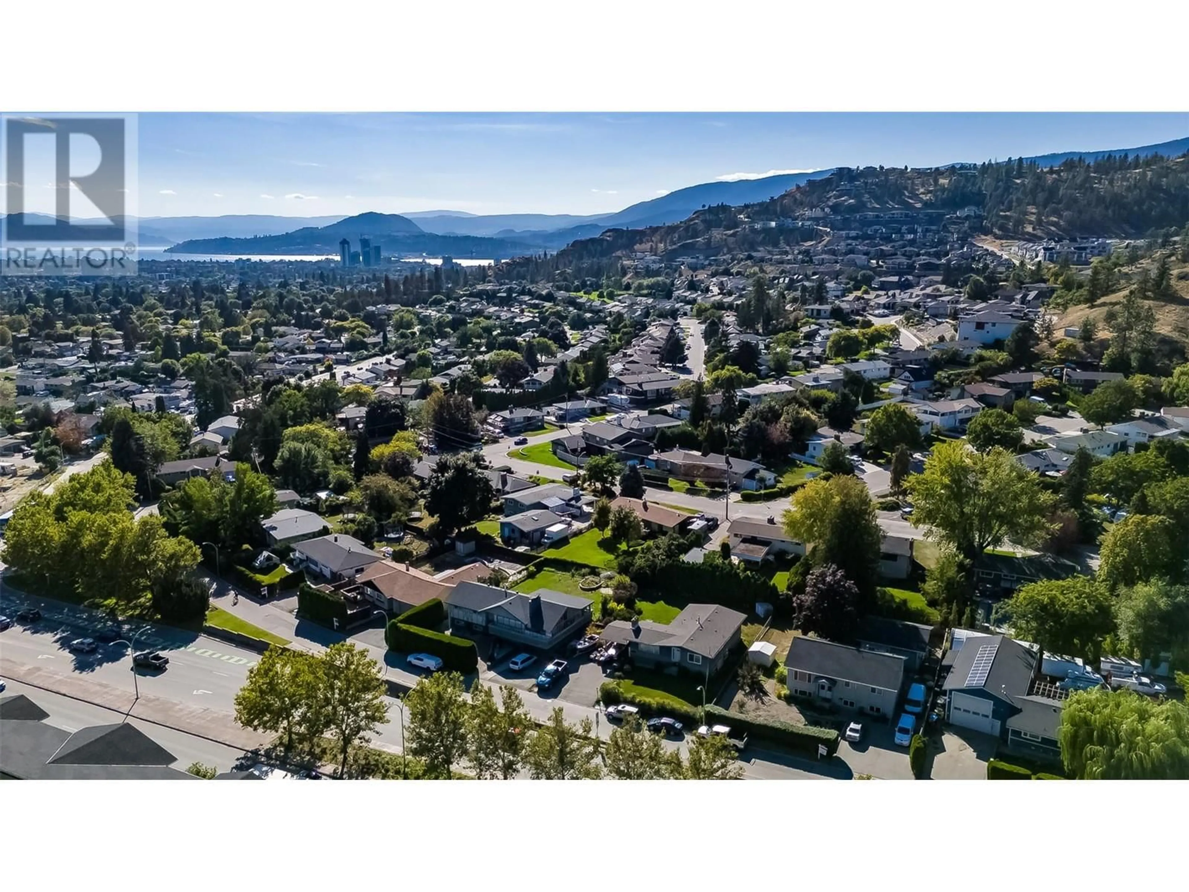 A pic from outside/outdoor area/front of a property/back of a property/a pic from drone, mountain view for 1880 BROADVIEW AVENUE, Kelowna British Columbia V1Y4N8