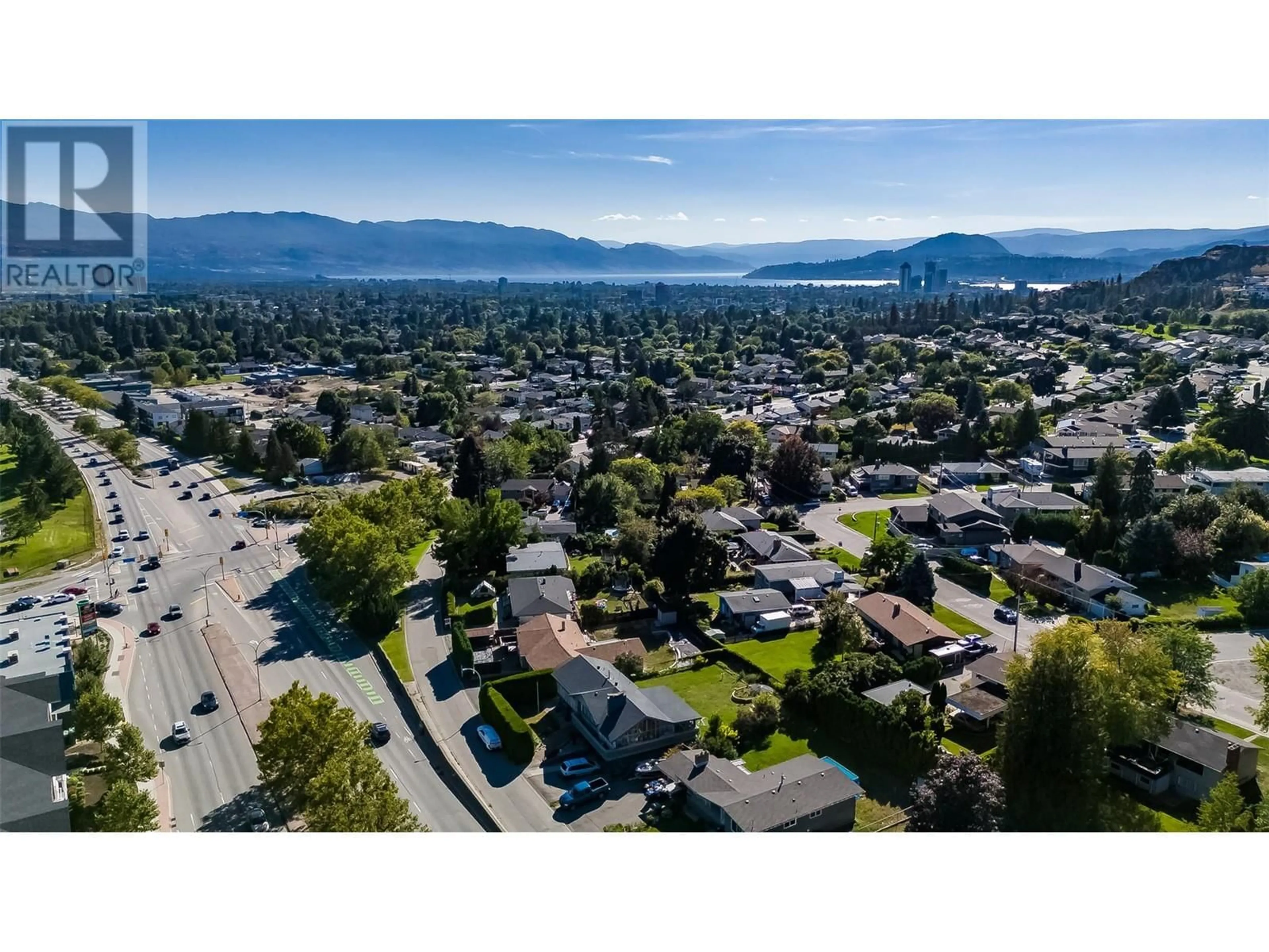 A pic from outside/outdoor area/front of a property/back of a property/a pic from drone, mountain view for 1880 BROADVIEW AVENUE, Kelowna British Columbia V1Y4N8