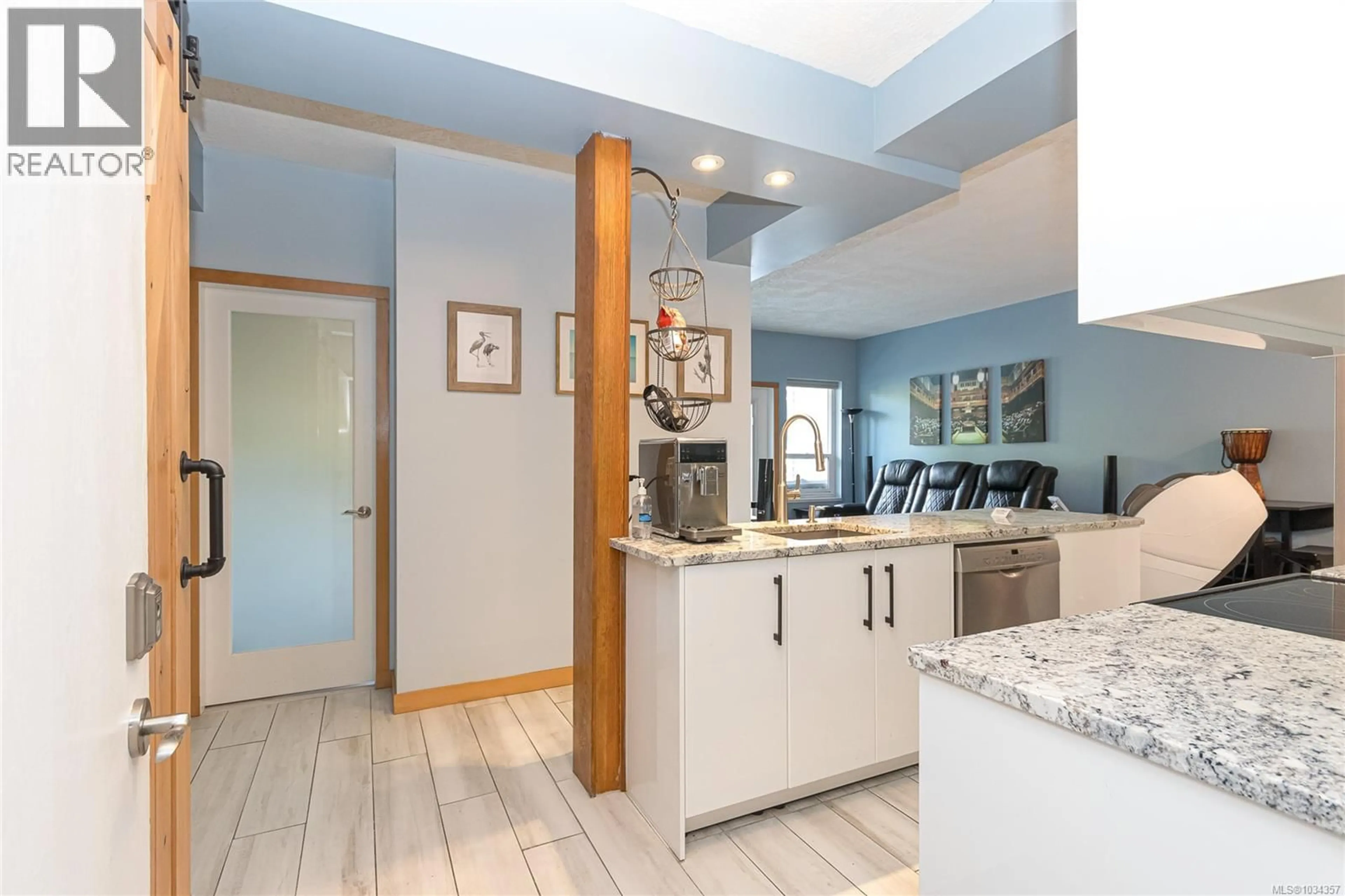 Open concept kitchen, ceramic/tile floor for 103 - 1351 ESQUIMALT ROAD, Esquimalt British Columbia V9A3R1