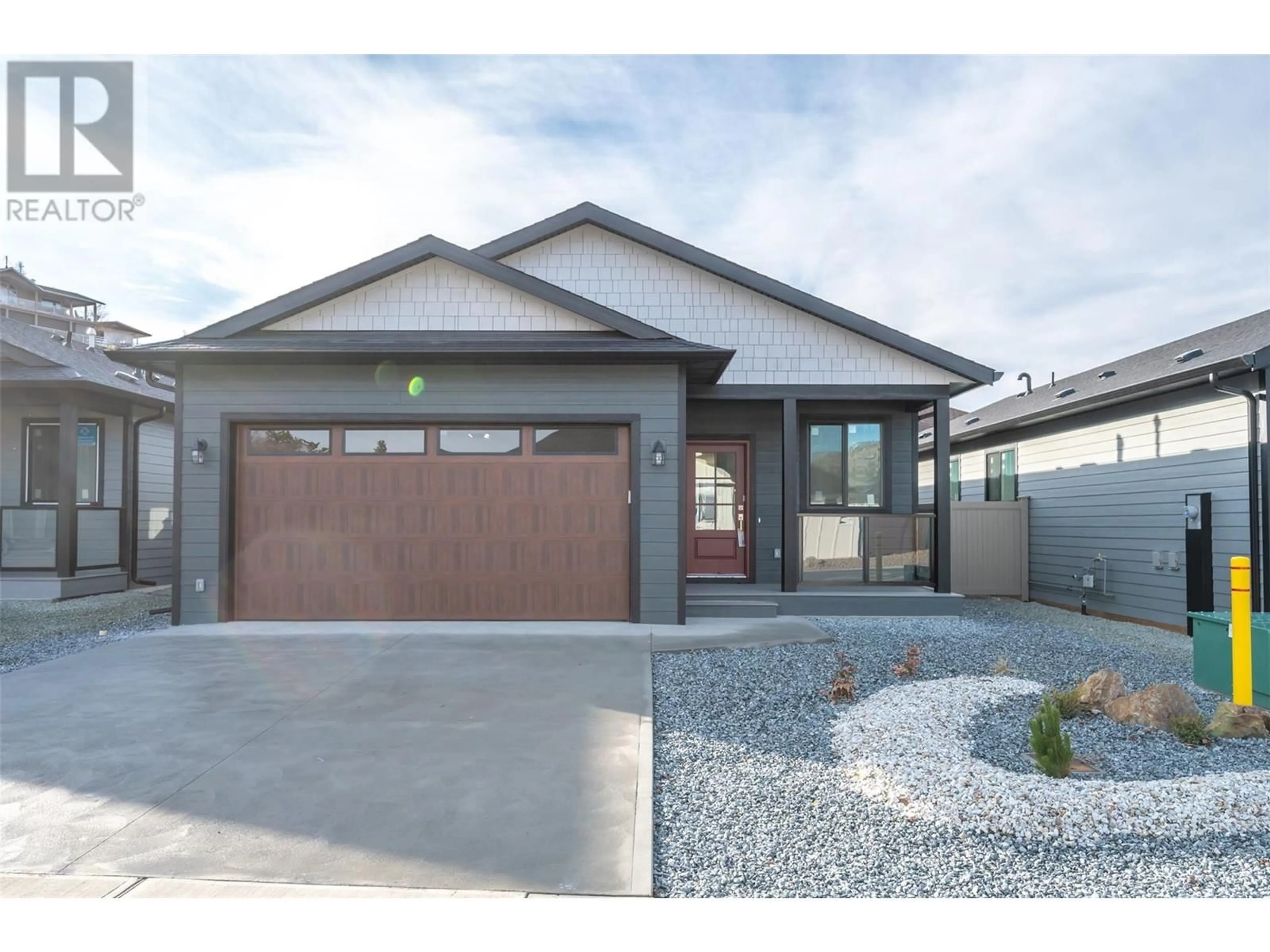 Home with brick exterior material, street for 243 BENTGRASS AVENUE, Oliver British Columbia V0H1T3