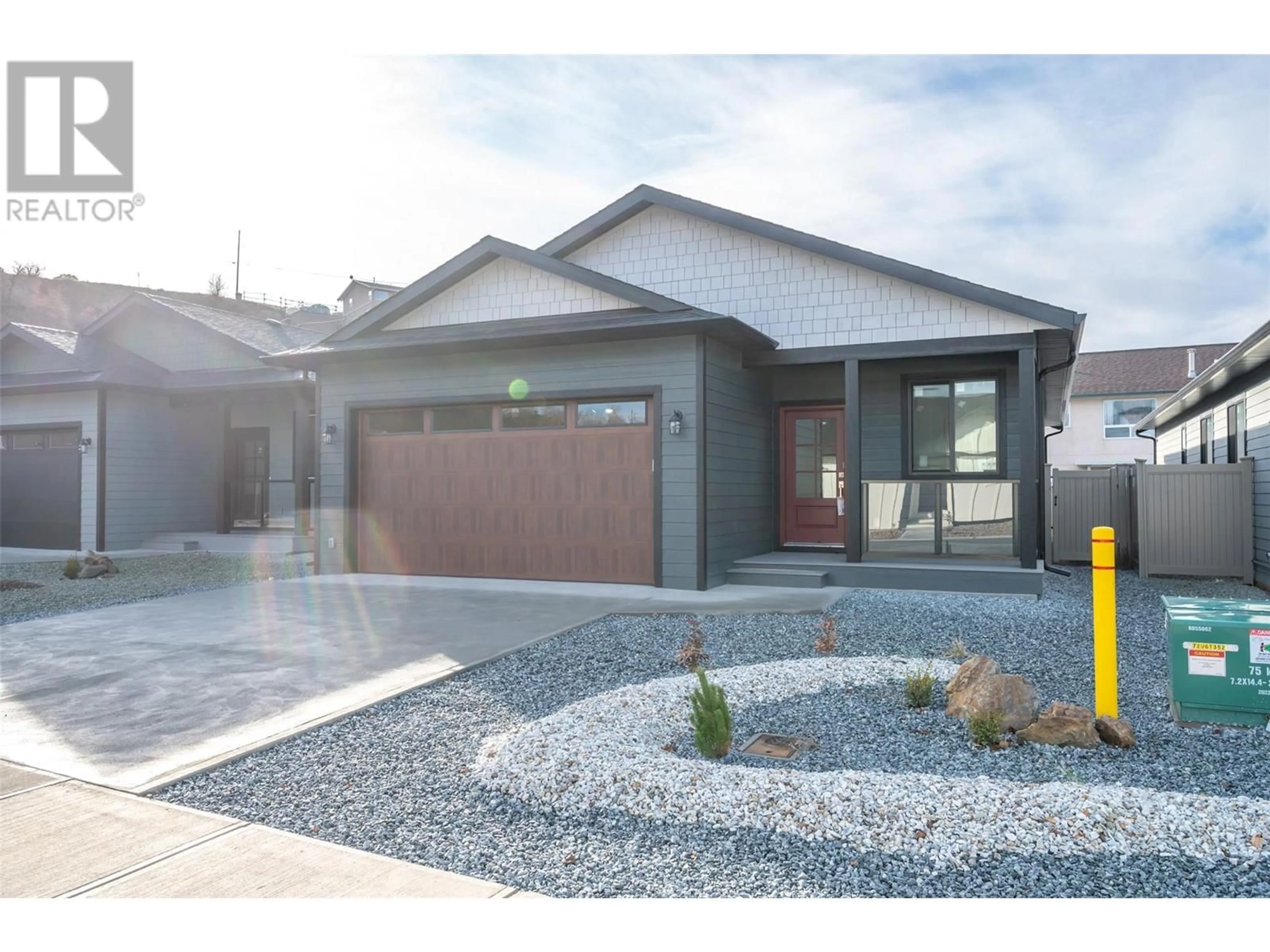 Home with brick exterior material, street for 243 BENTGRASS AVENUE, Oliver British Columbia V0H1T3