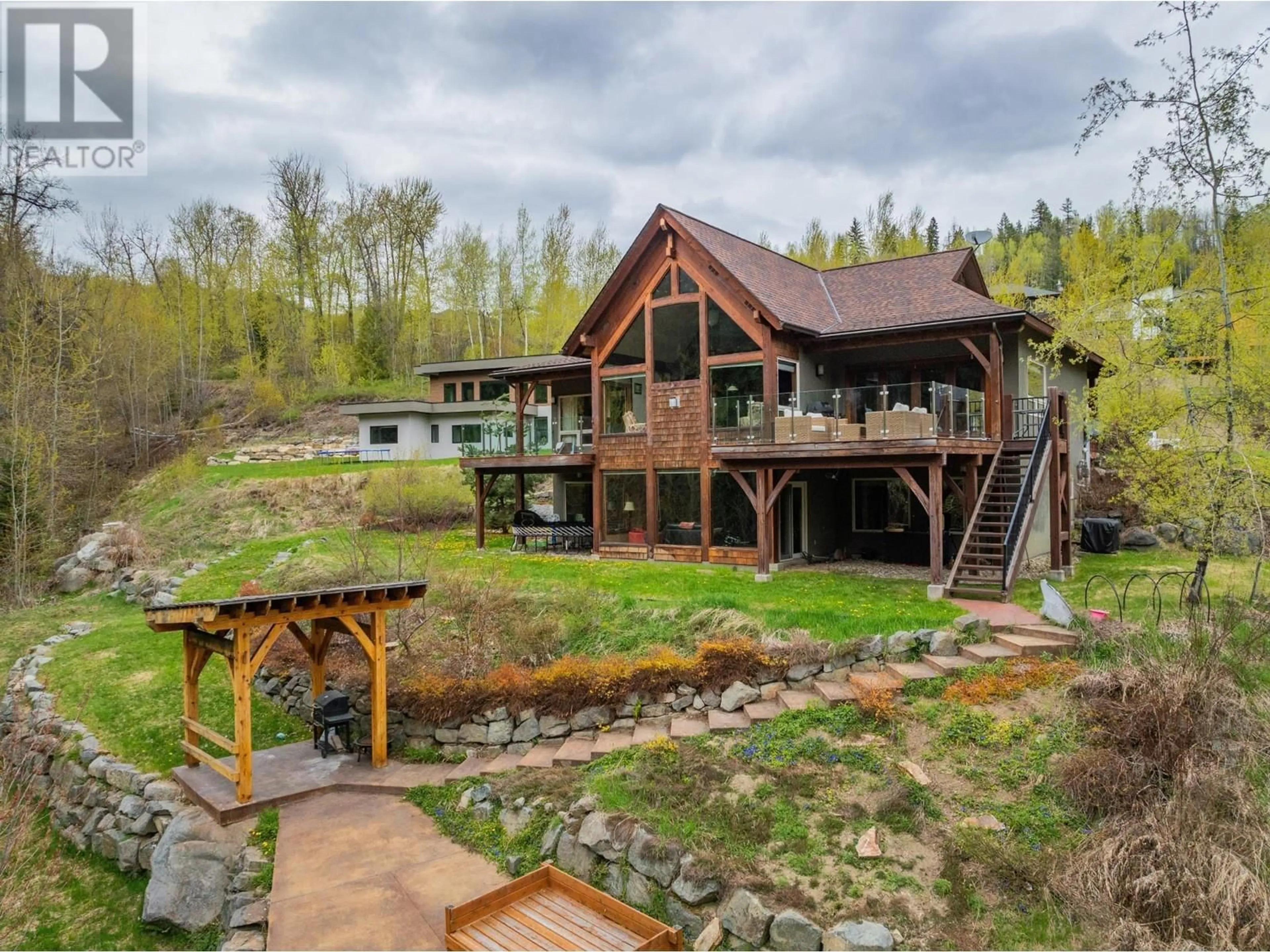 A pic from outside/outdoor area/front of a property/back of a property/a pic from drone, water/lake/river/ocean view for 817 WHITE TAIL DRIVE, Rossland British Columbia V0G1Y0