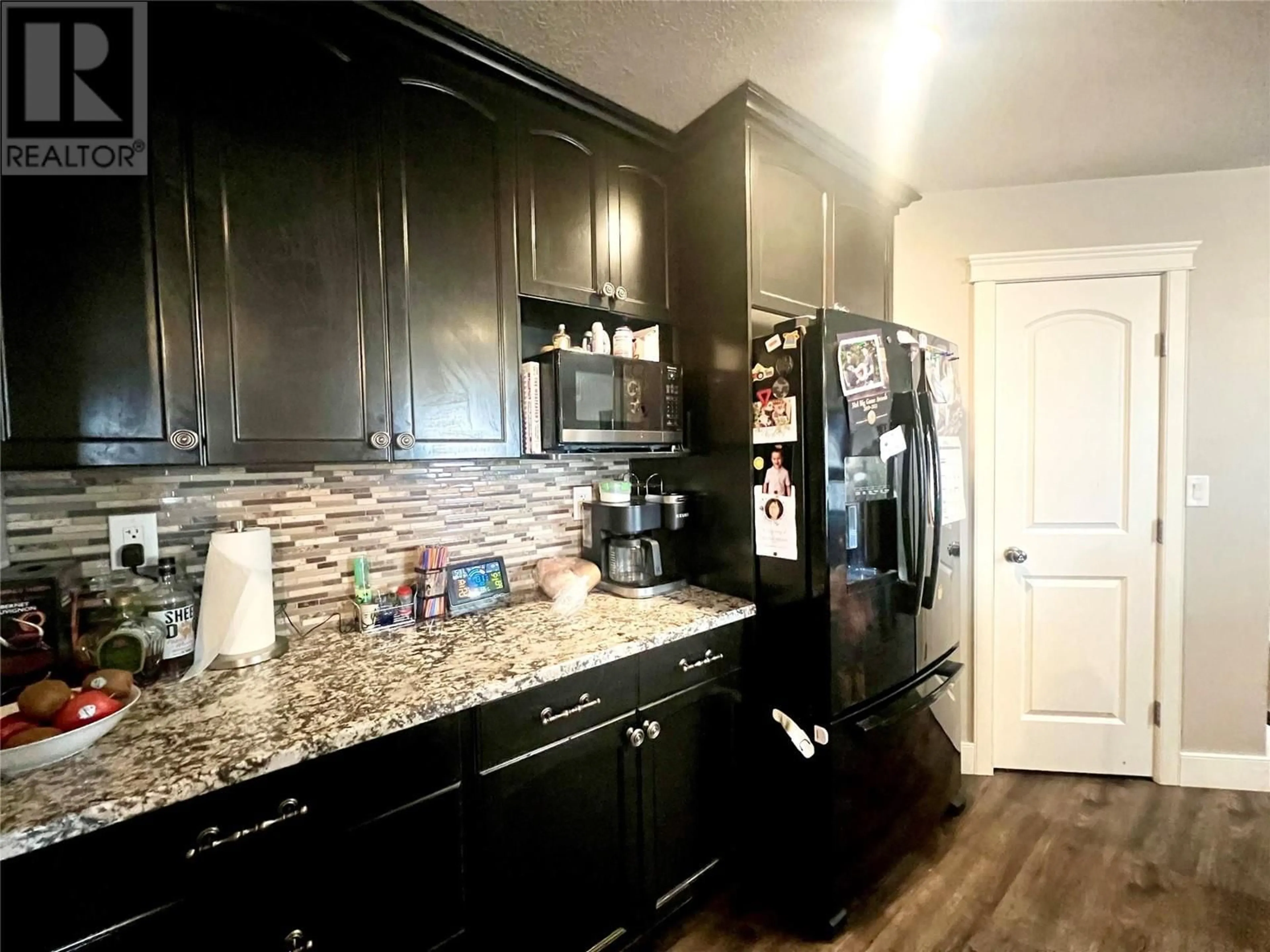 Open concept kitchen, unknown for 1724 84 AVENUE, Dawson Creek British Columbia V1G0E1
