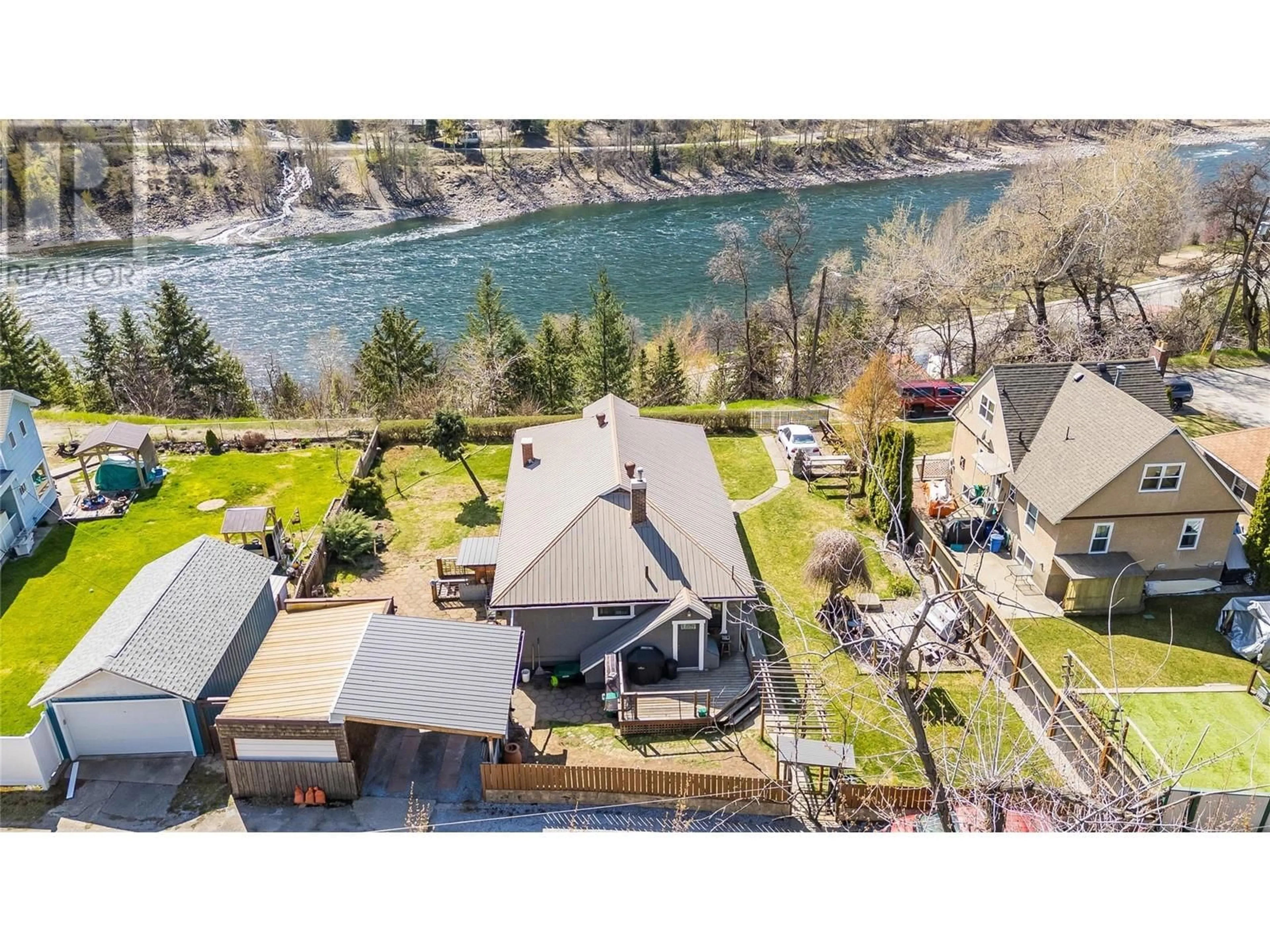 A pic from outside/outdoor area/front of a property/back of a property/a pic from drone, water/lake/river/ocean view for 2385 ROCKLAND AVENUE, Trail British Columbia V1R3G4