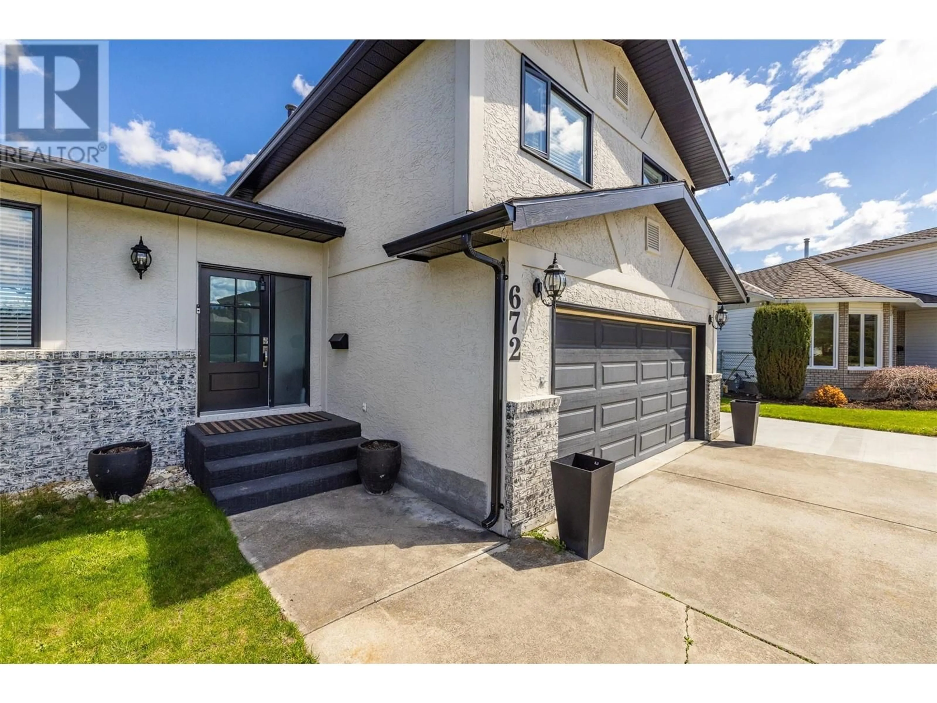 Home with brick exterior material, street for 672 GREENE ROAD, Kelowna British Columbia V1W1B8