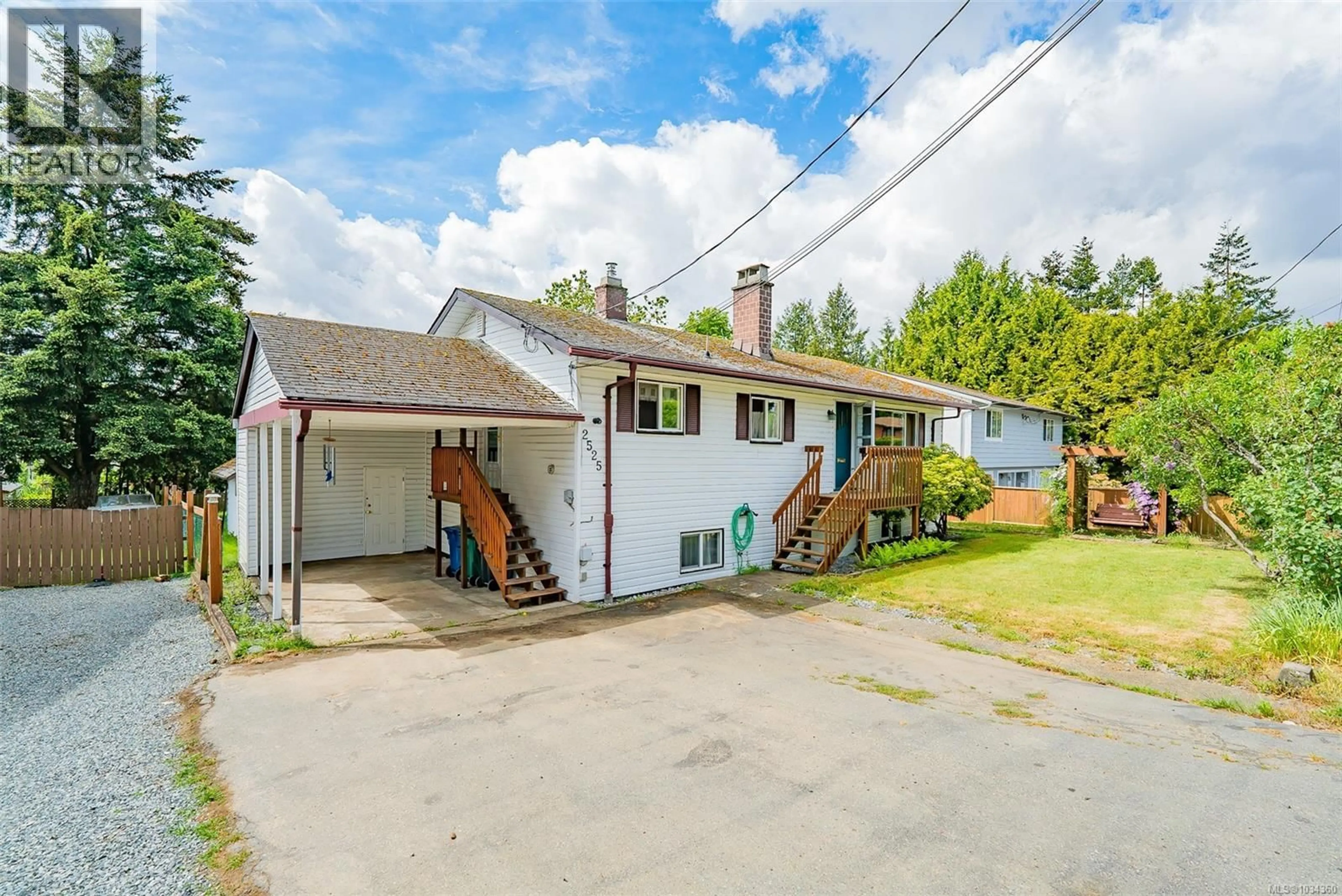 A pic from outside/outdoor area/front of a property/back of a property/a pic from drone, street for 2525 ROSSTOWN ROAD, Nanaimo British Columbia V9T3R9