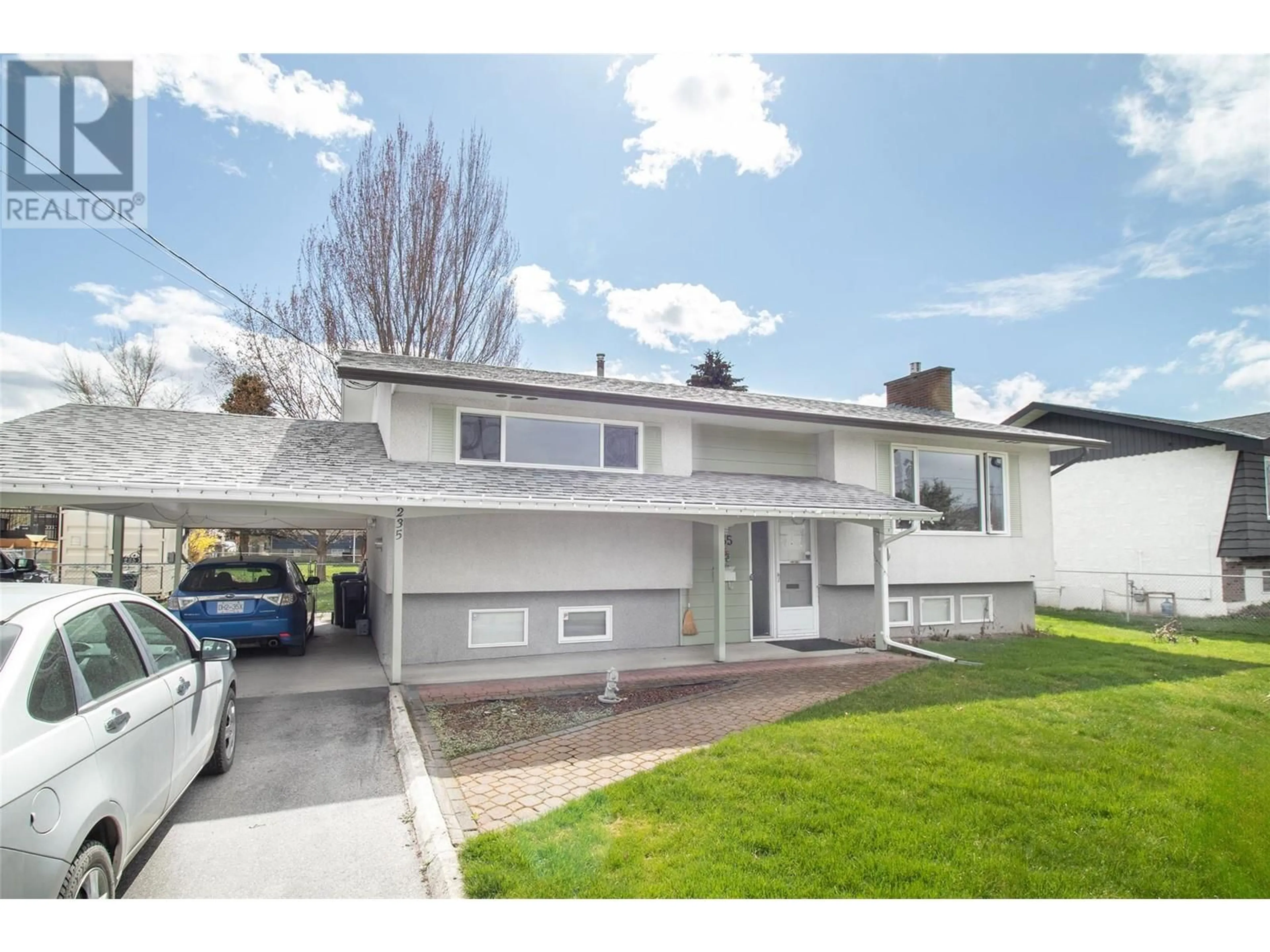 Home with vinyl exterior material, street for 235 PEARSON ROAD, Kelowna British Columbia V1X2L5
