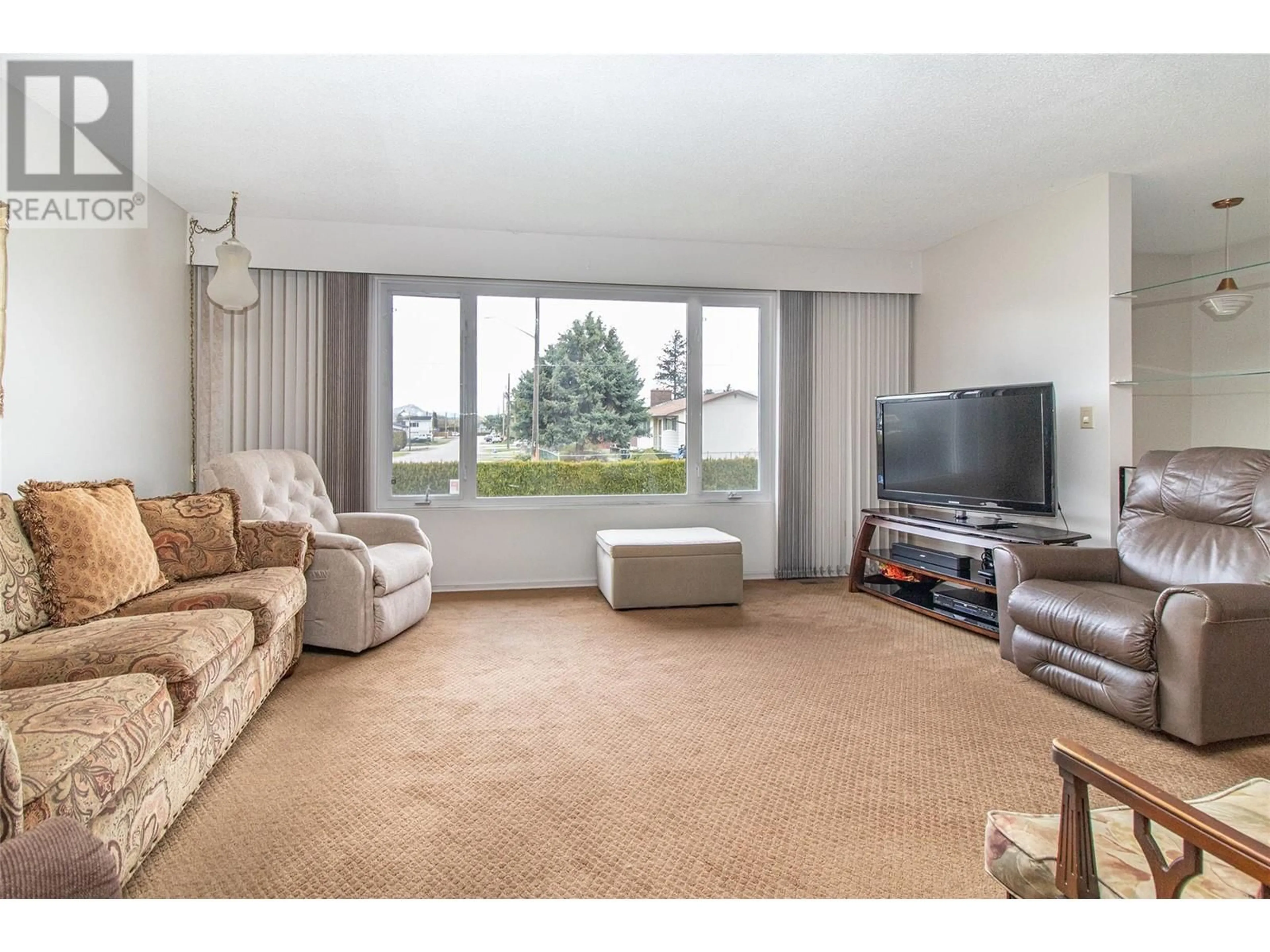 Living room with furniture, unknown for 235 PEARSON ROAD, Kelowna British Columbia V1X2L5