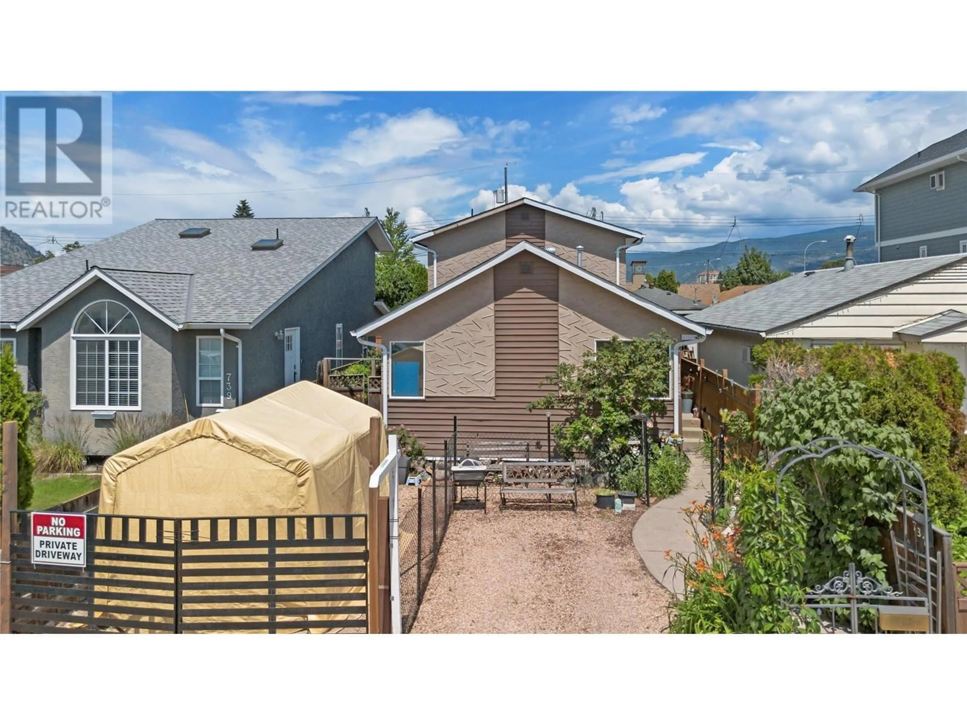 A pic from outside/outdoor area/front of a property/back of a property/a pic from drone, mountain view for 731 REVELSTOKE AVENUE, Penticton British Columbia V2A2J1