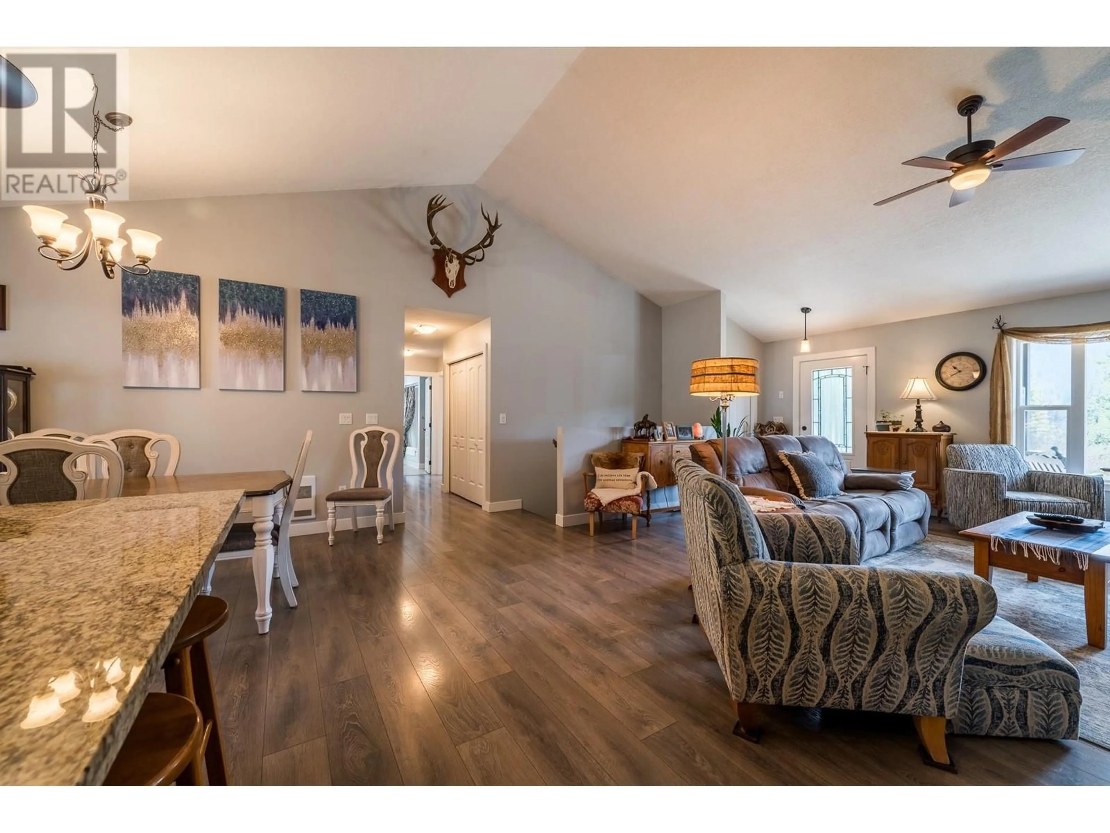 Living room with furniture, wood/laminate floor for 2825 BARRIERE LAKES ROAD, Barriere British Columbia V0E1E0