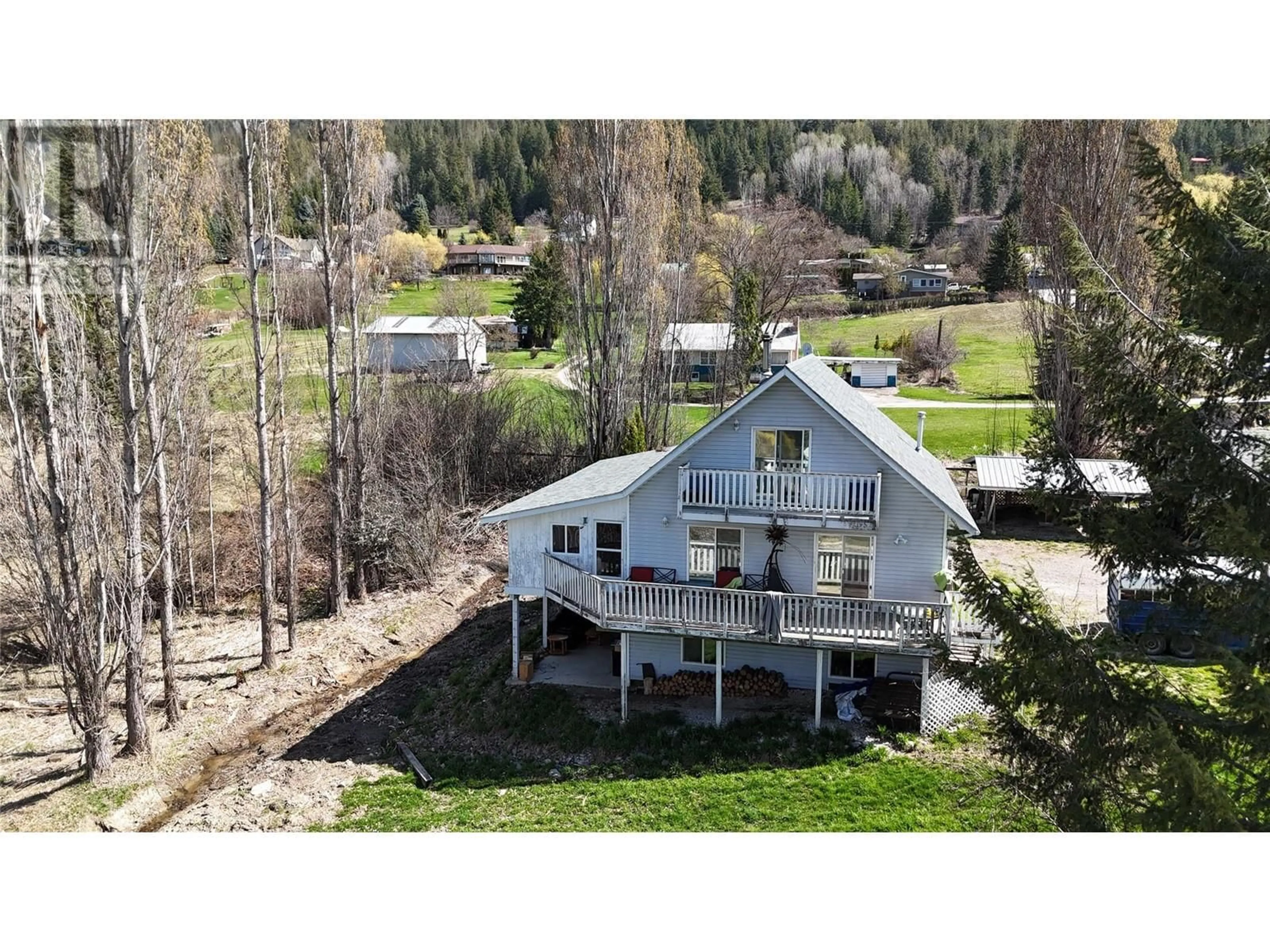 A pic from outside/outdoor area/front of a property/back of a property/a pic from drone, mountain view for 610 WYNNDEL ROAD, Wynndel British Columbia V0B2N1