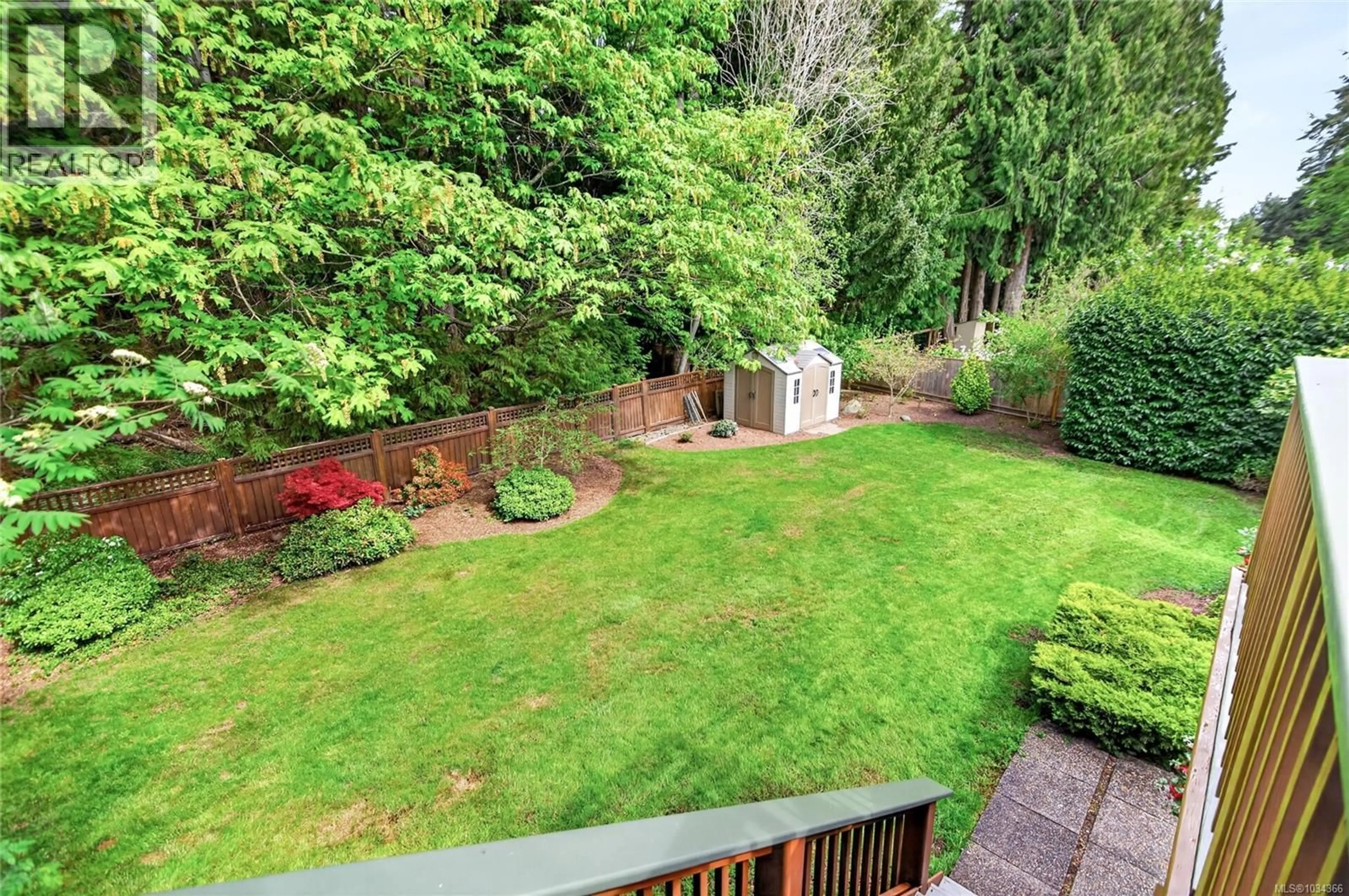 A pic from outside/outdoor area/front of a property/back of a property/a pic from drone, forest/trees view for 1015 KINGSLEY CRESCENT, Comox British Columbia V9M3R7