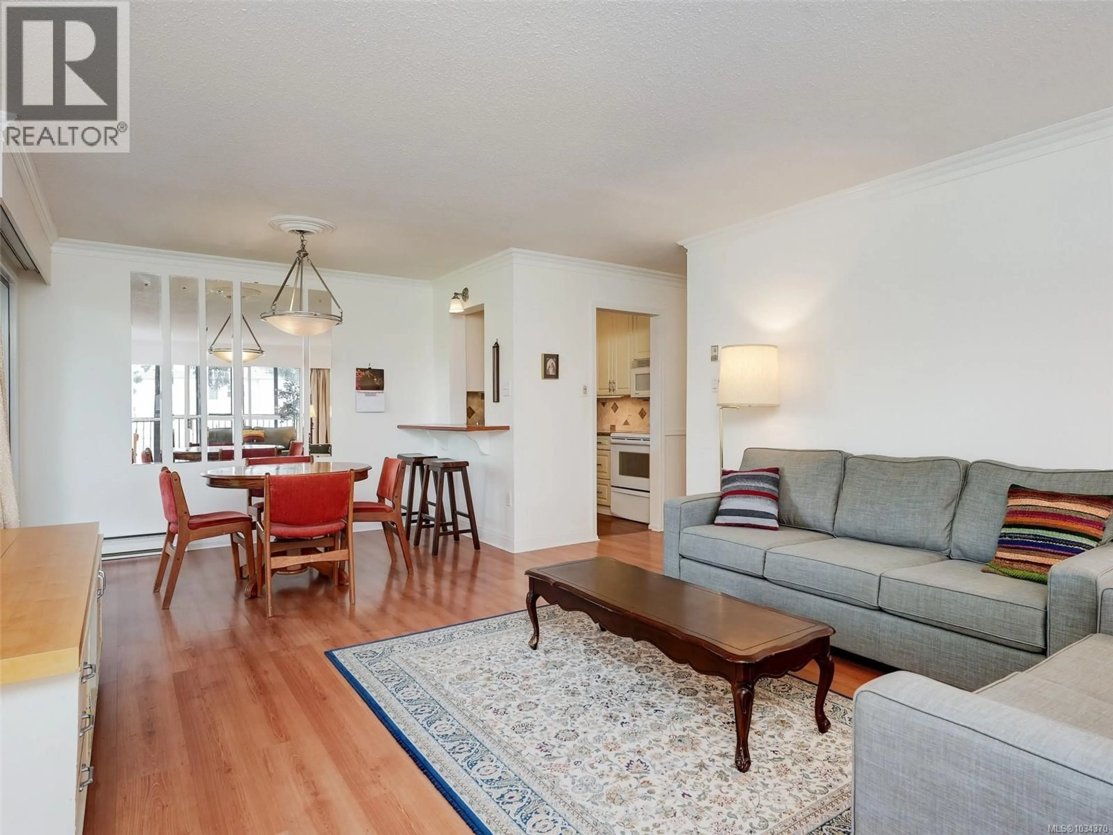 Living room with furniture, wood/laminate floor for 302 - 1101 HILDA STREET, Victoria British Columbia V8V4T2