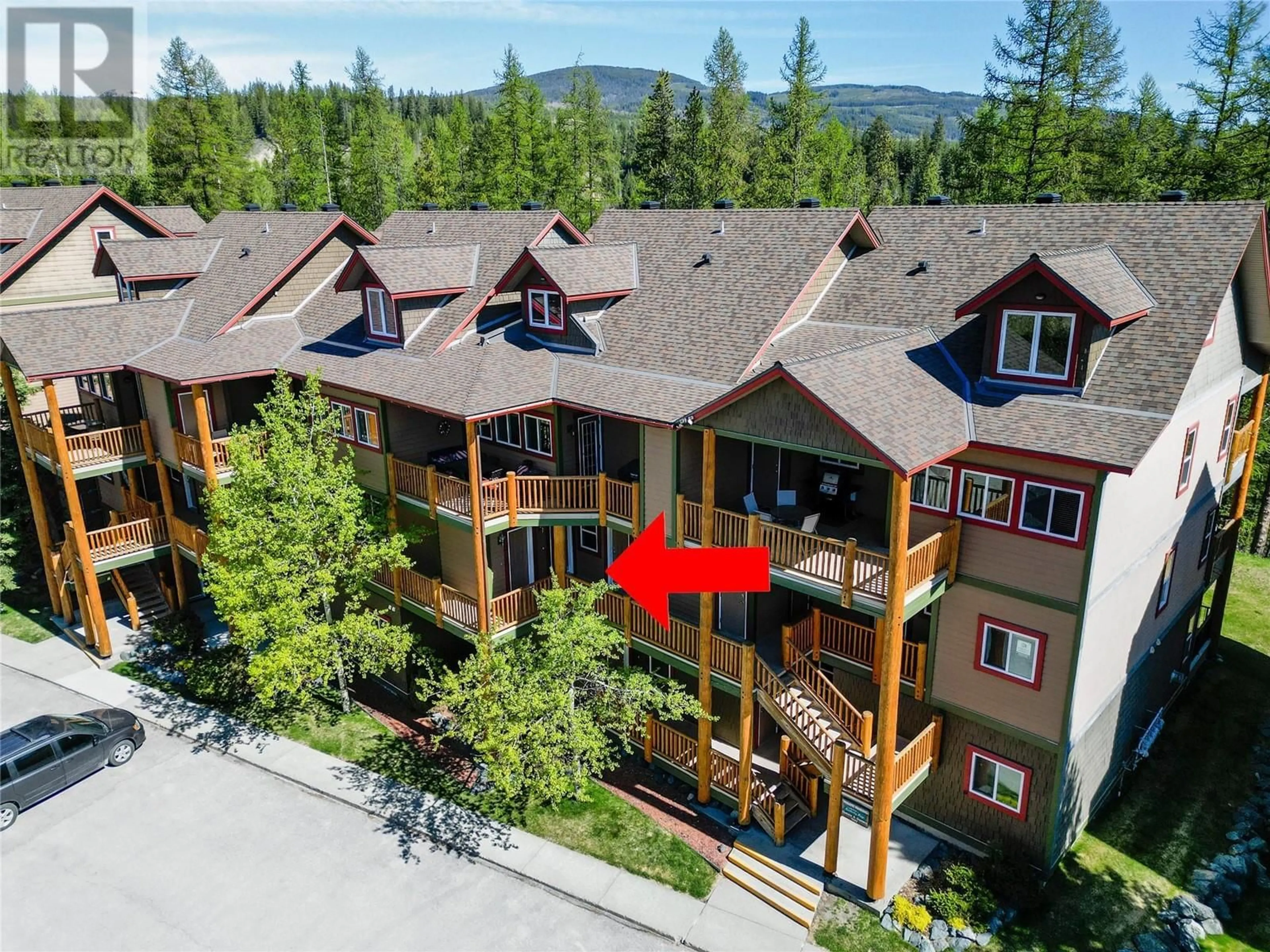 A pic from outside/outdoor area/front of a property/back of a property/a pic from drone, mountain view for 310 - 300 STEMWINDER DRIVE, Kimberley British Columbia V1A3E9